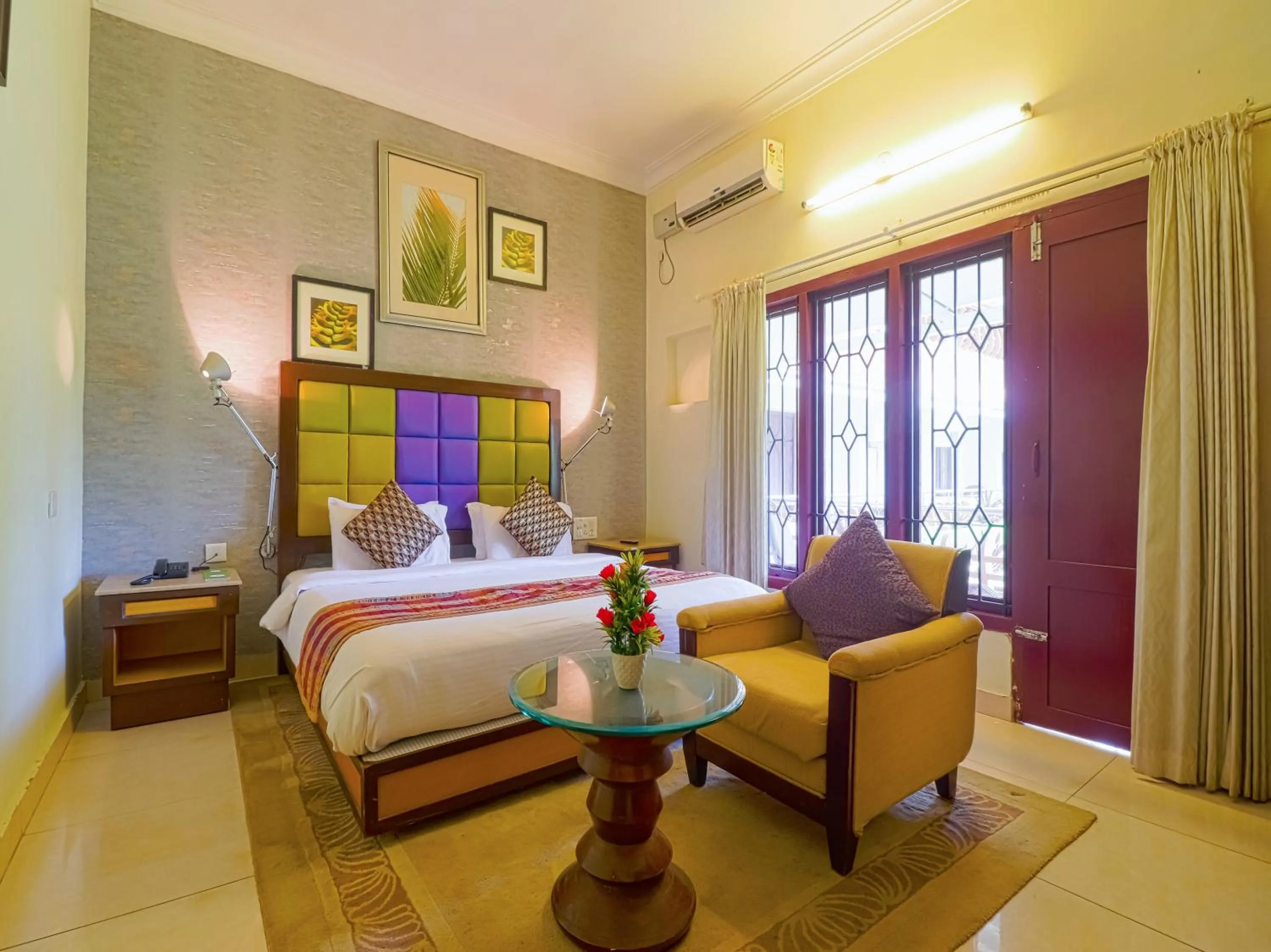 Deluxe Double Room with Balcony - single occupancy in The Byke Puja Samudra