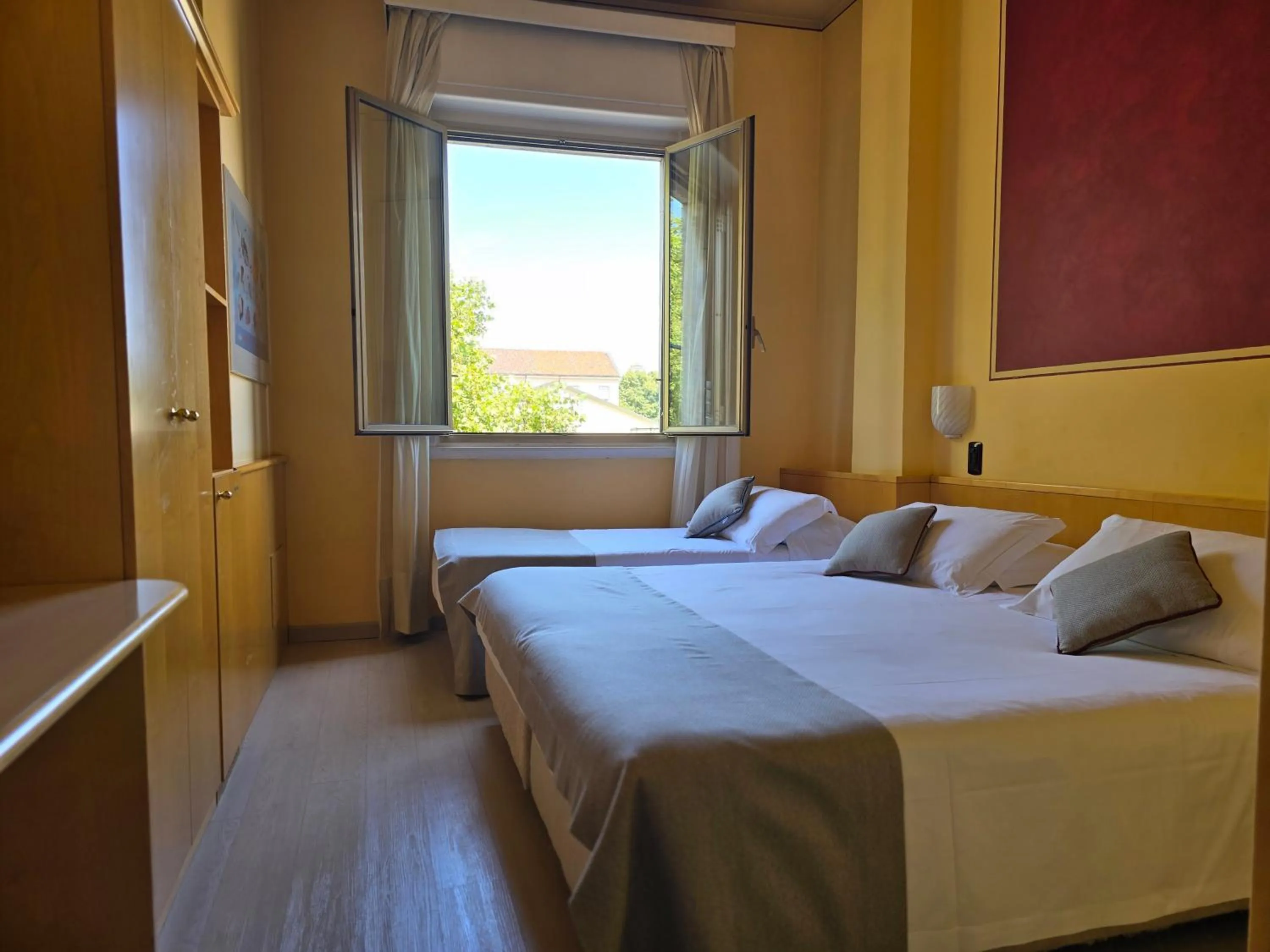 Triple Room in Mokinba Hotels Sant'Ambroeus
