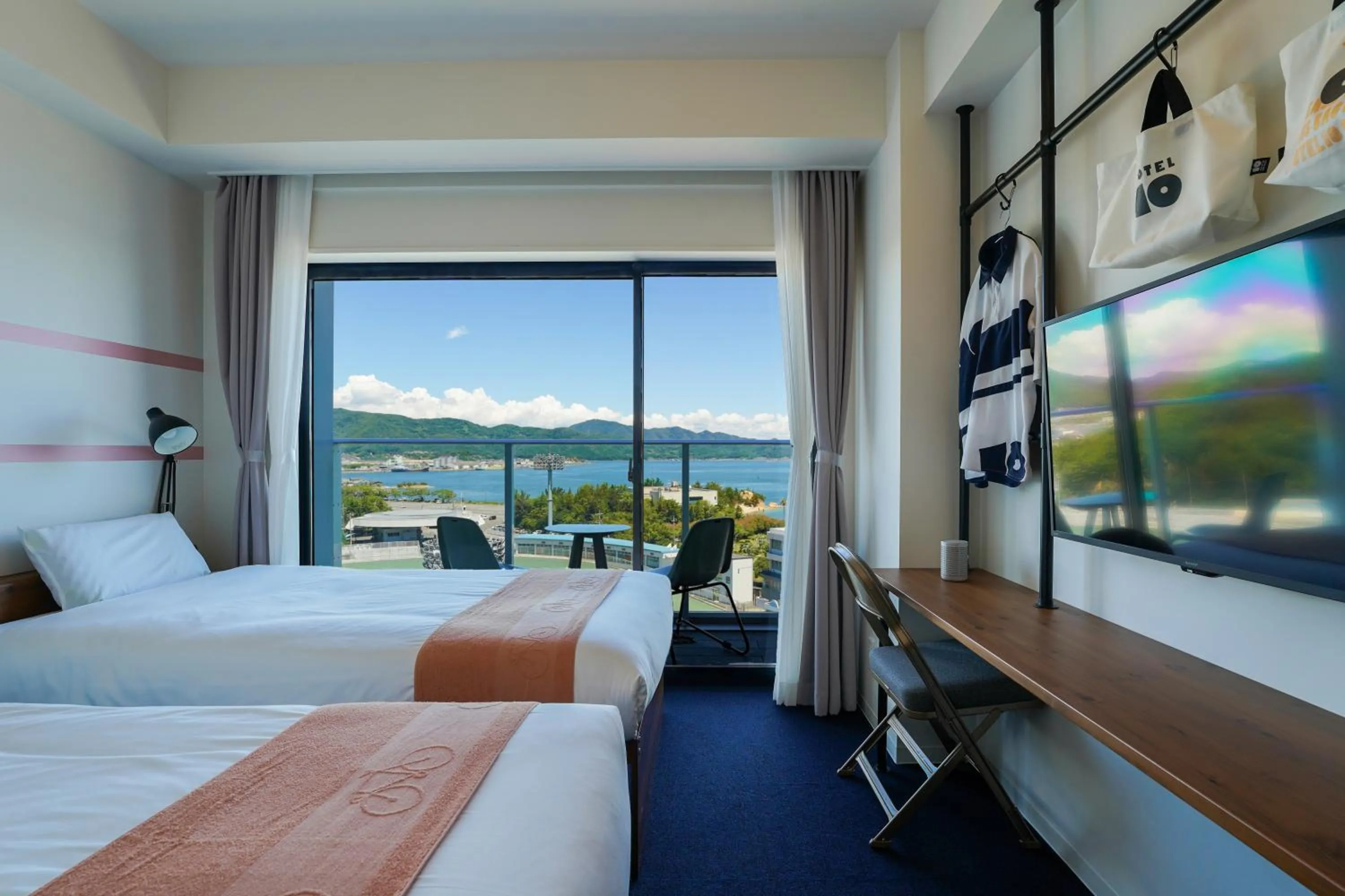 Twin Room with Sea View in SETOUCHI KEIRIN HOTEL 10 by Onko Chishin
