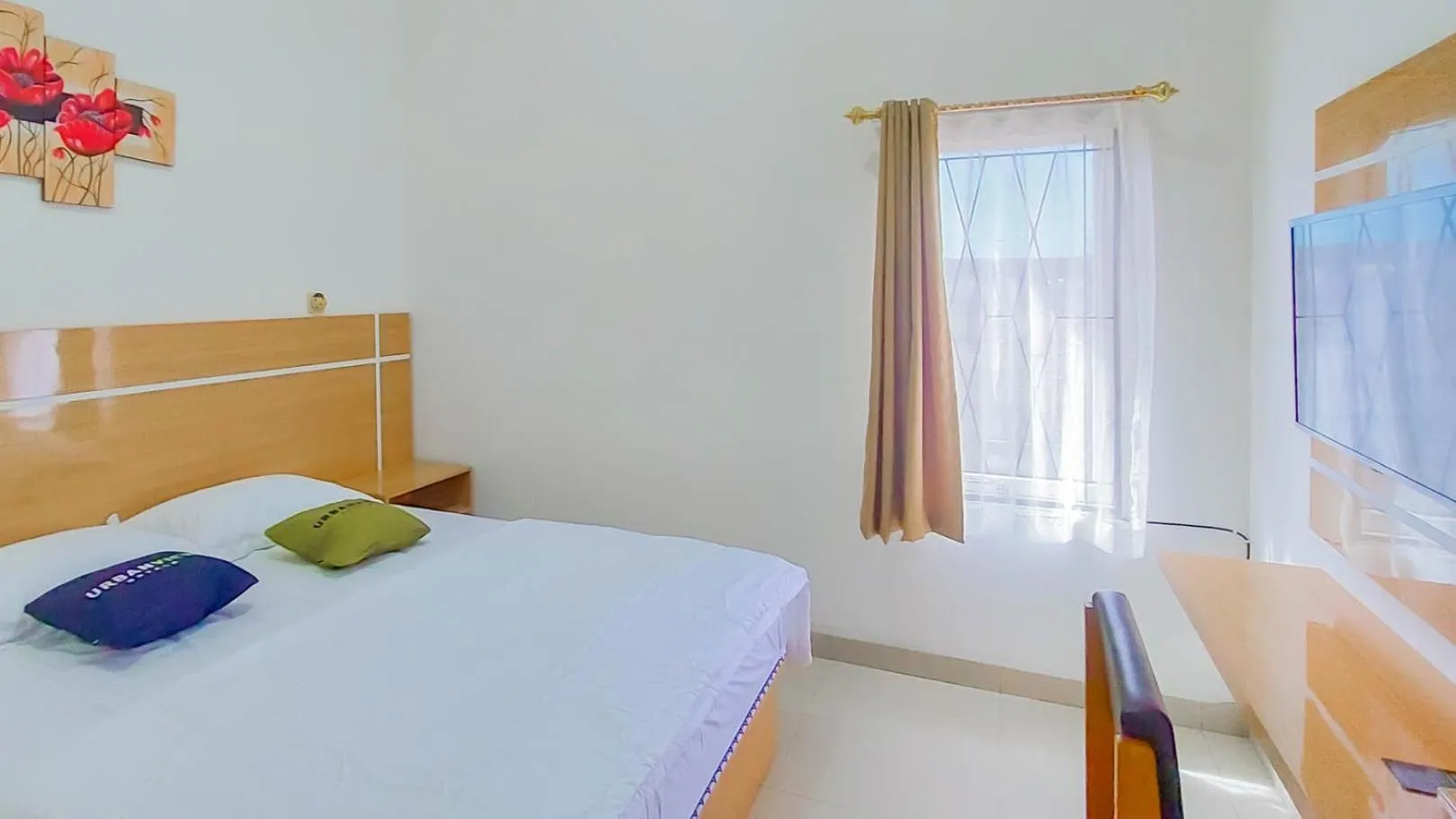 Superior Double Room in Urbanview Hotel Bundaran Besar Palangkaraya by RedDoorz