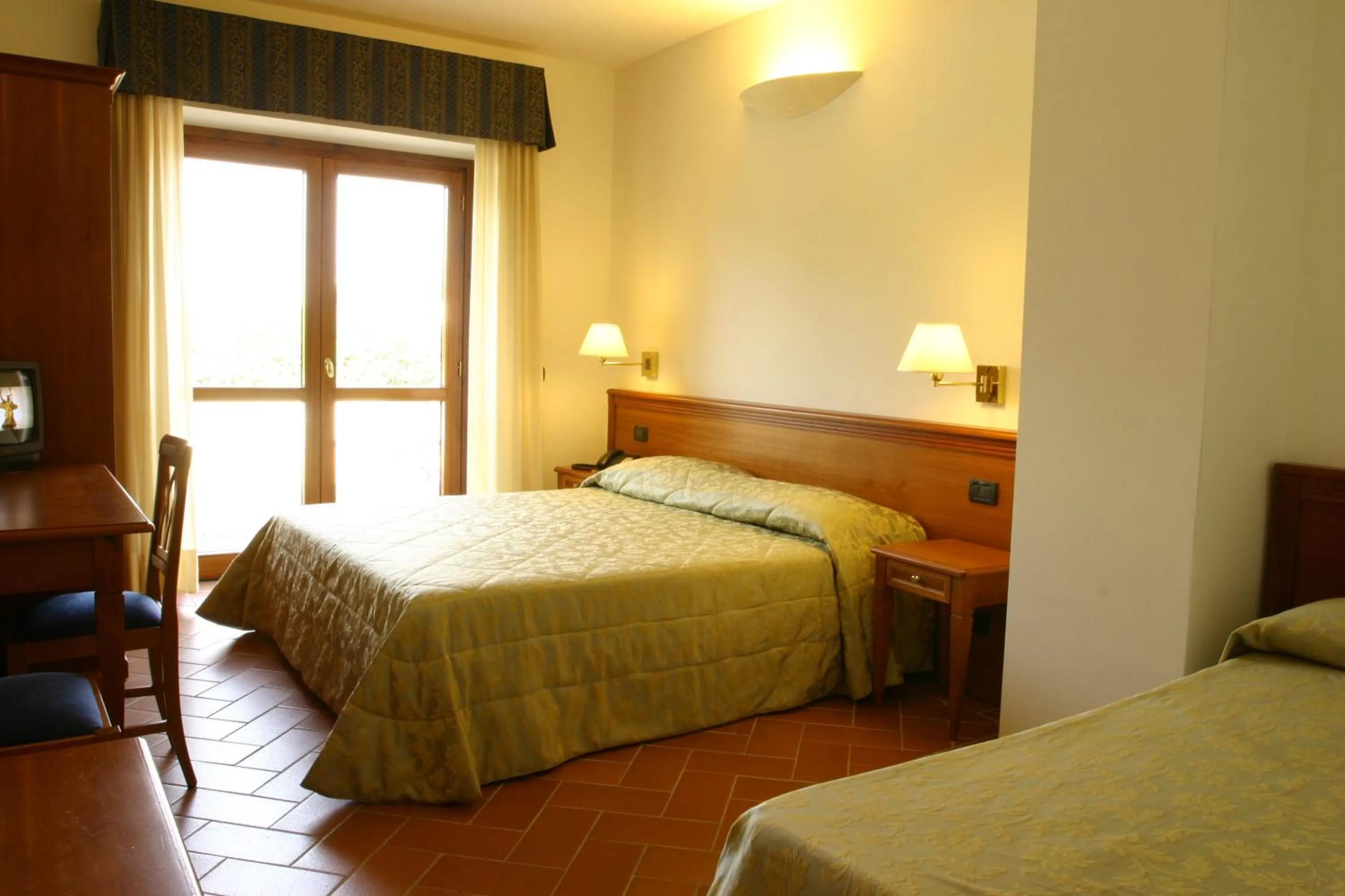 Triple Room in Hotel Villa Dei Bosconi