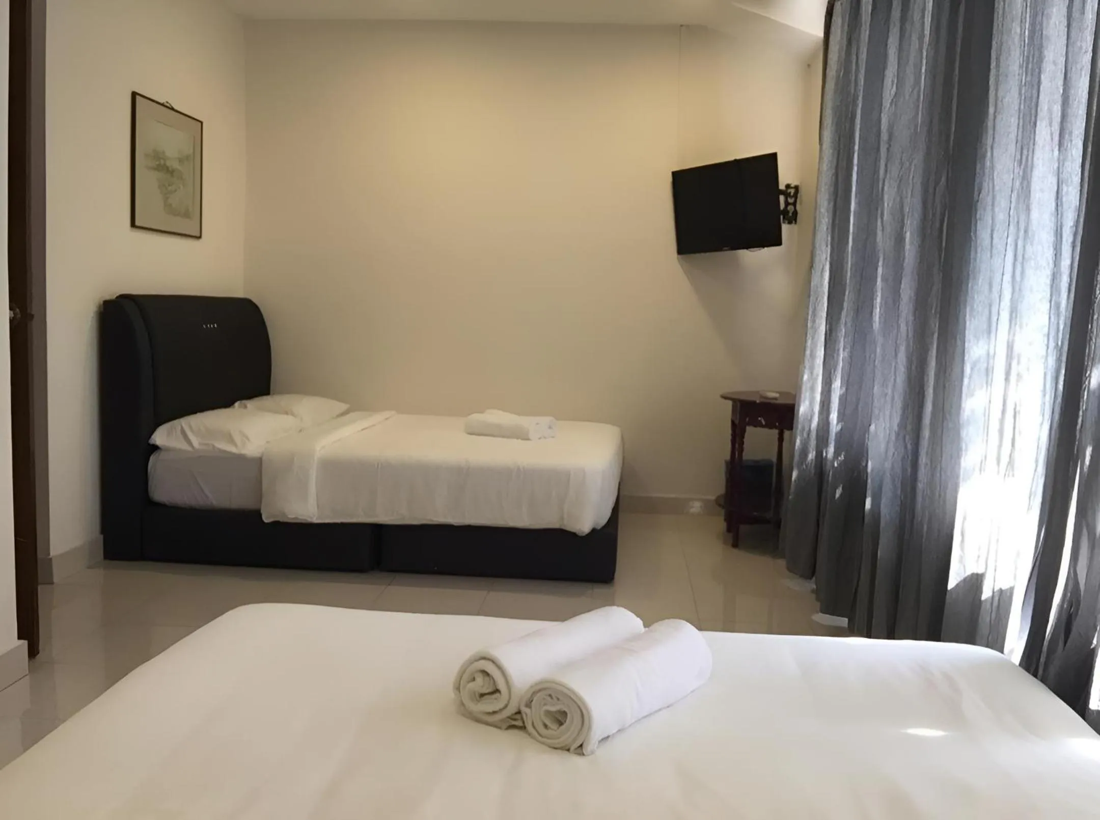 Quadruple Room with Bathroom in FKI INTERNATIONAL HOTEL