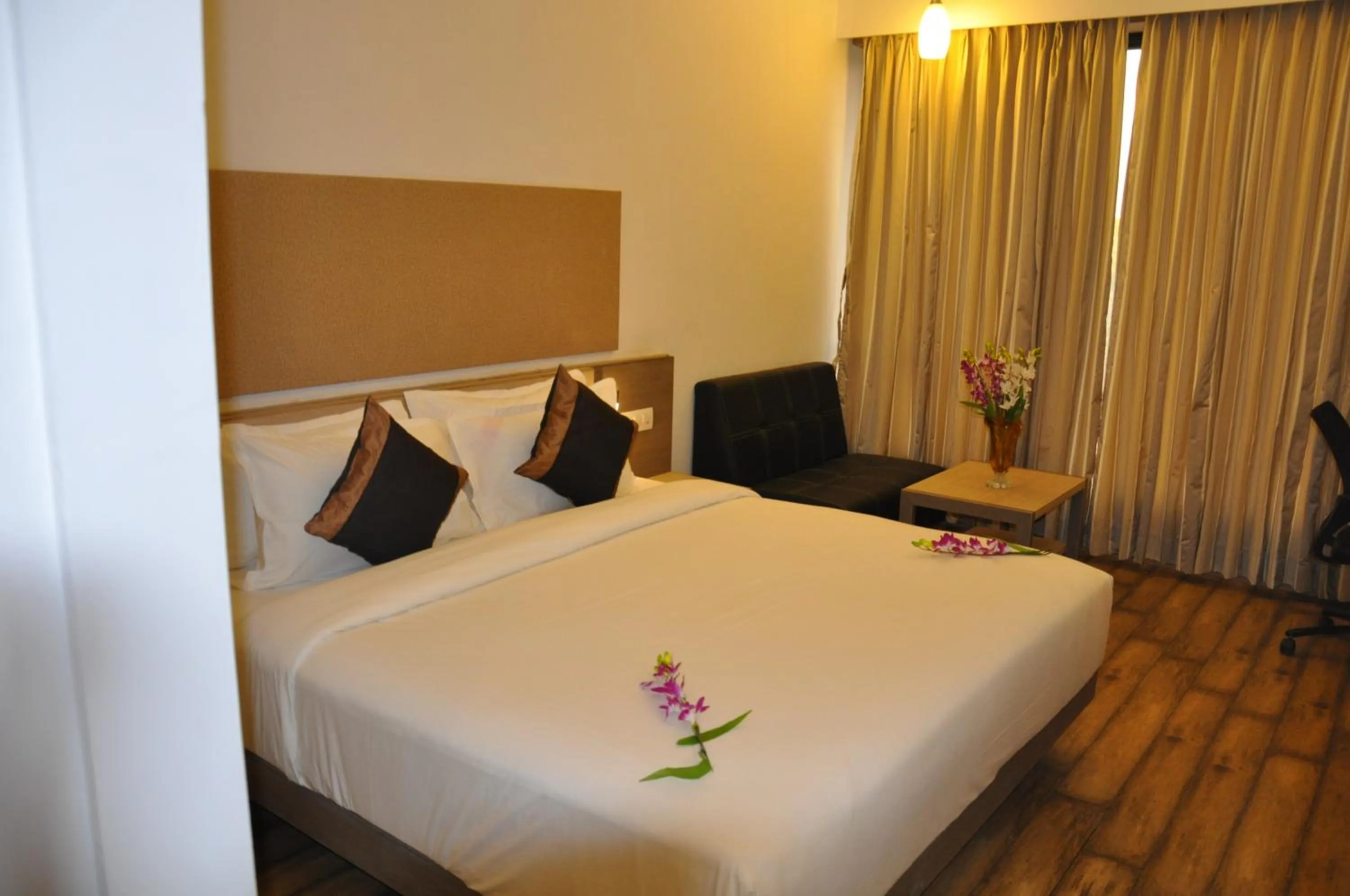 Superior King Room in Pride Biznotel Manjusar Vadodara Near Sokhda Lake