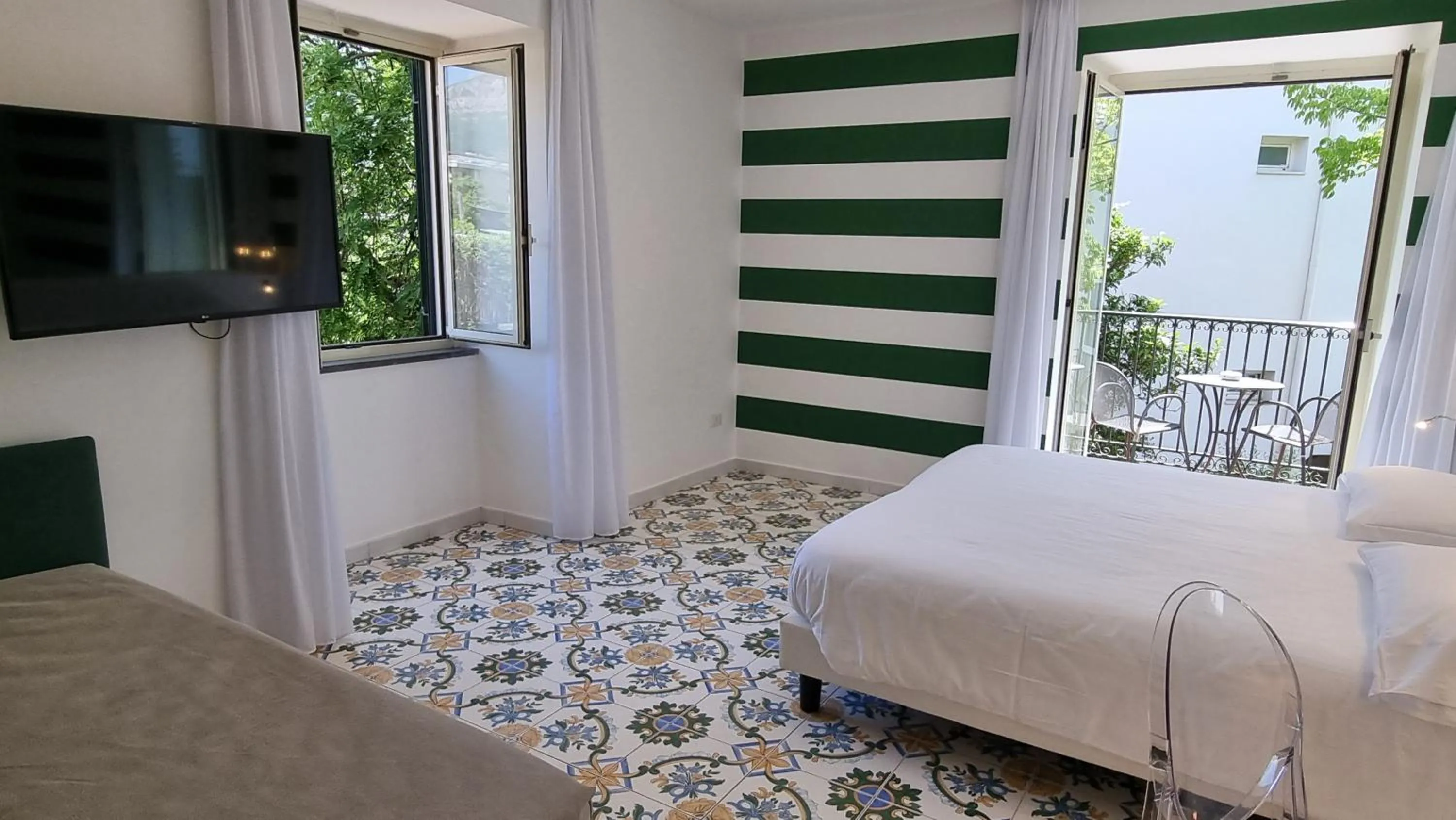 Classic Quadruple Room in Hotel Alpha