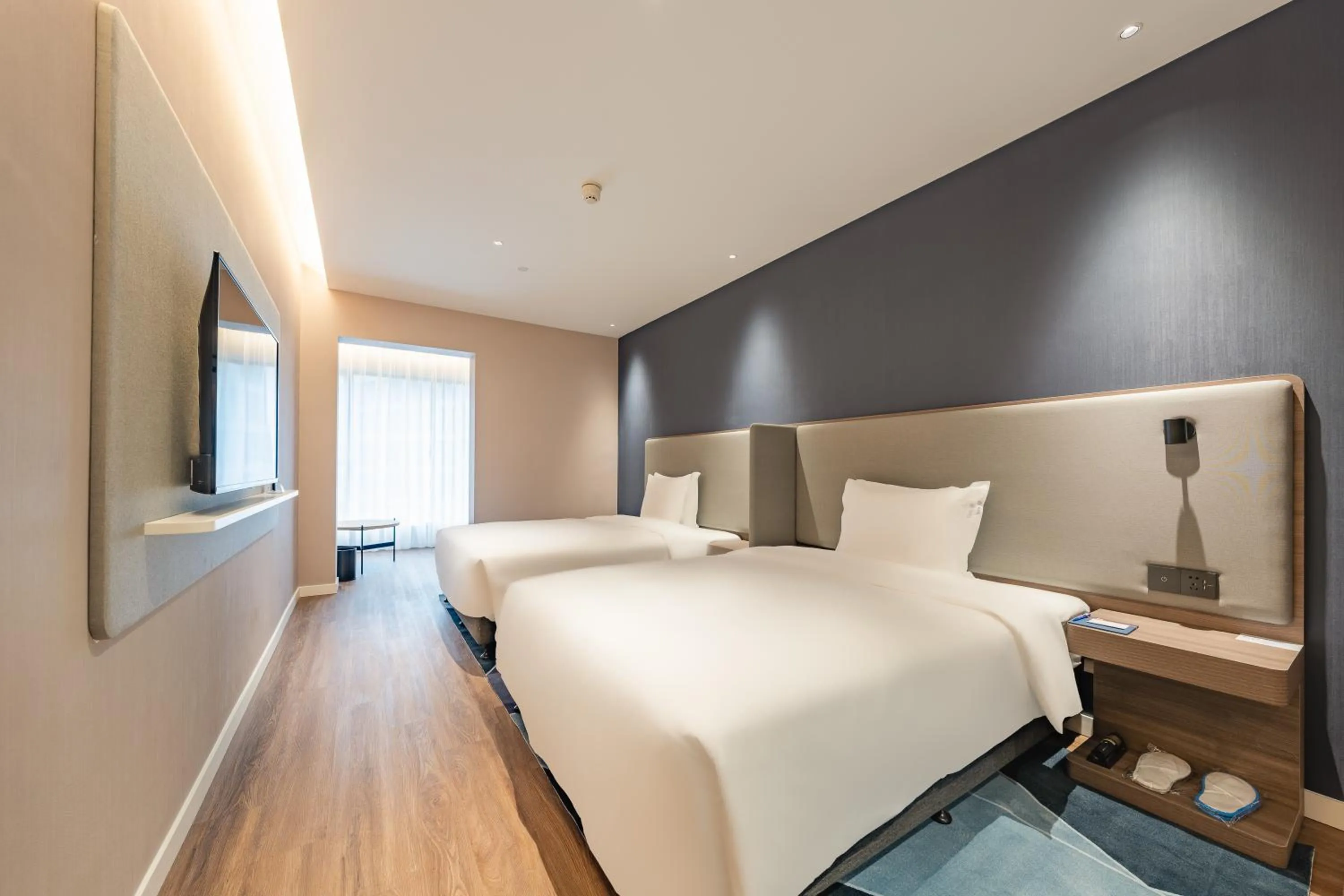 Standard Queen Room with Two Queen Beds and City View in Holiday Inn Express Shanghai Expo Centre by IHG