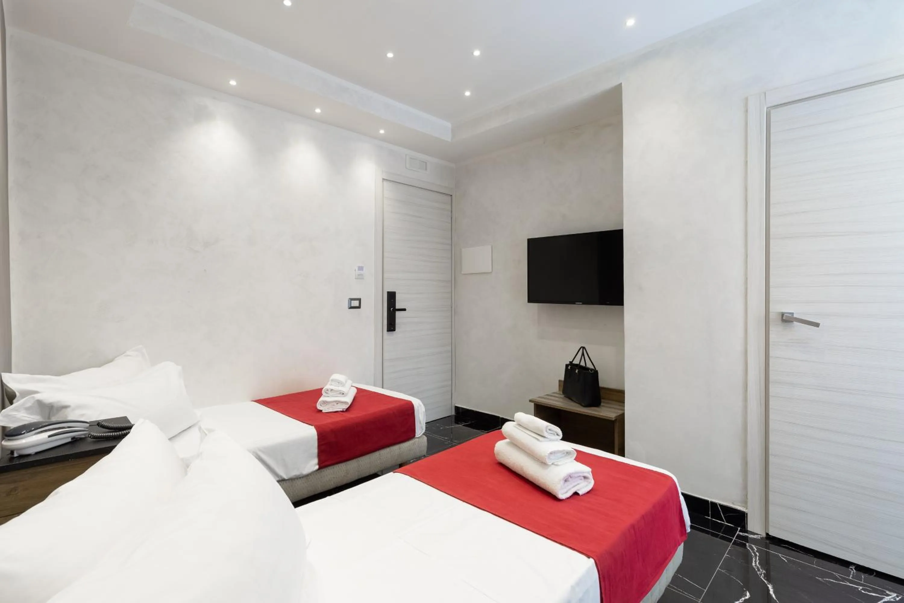 Quadruple Room in Hotel Bella Napoli