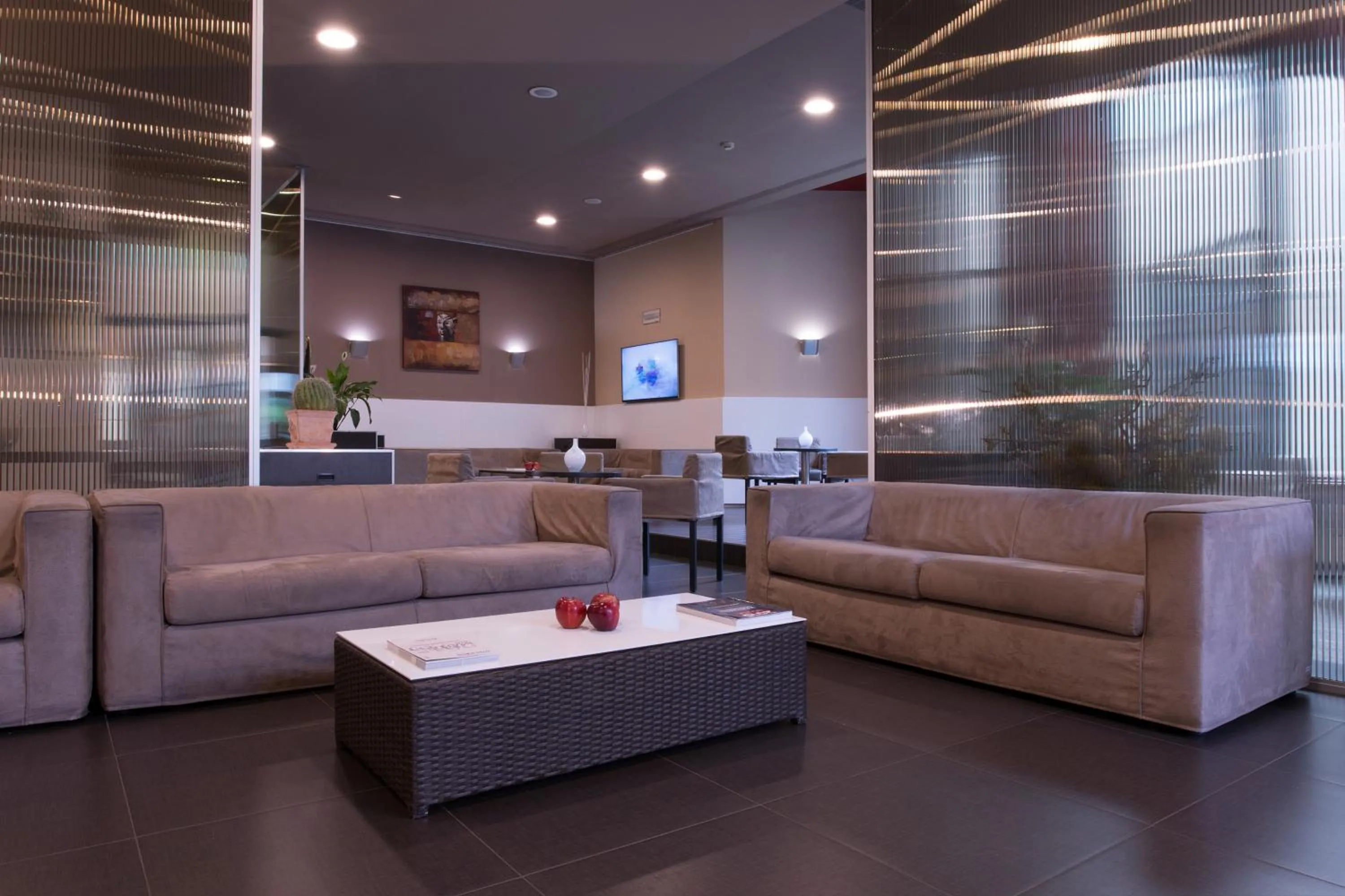 Lobby or reception in voco Parma & Congressi by IHG