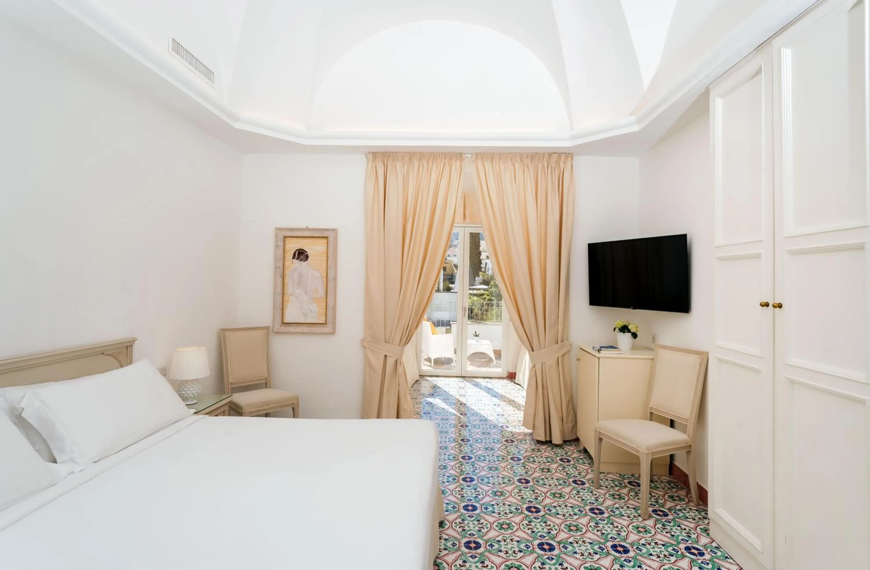 Quadruple Room with Terrace in Hotel Syrene