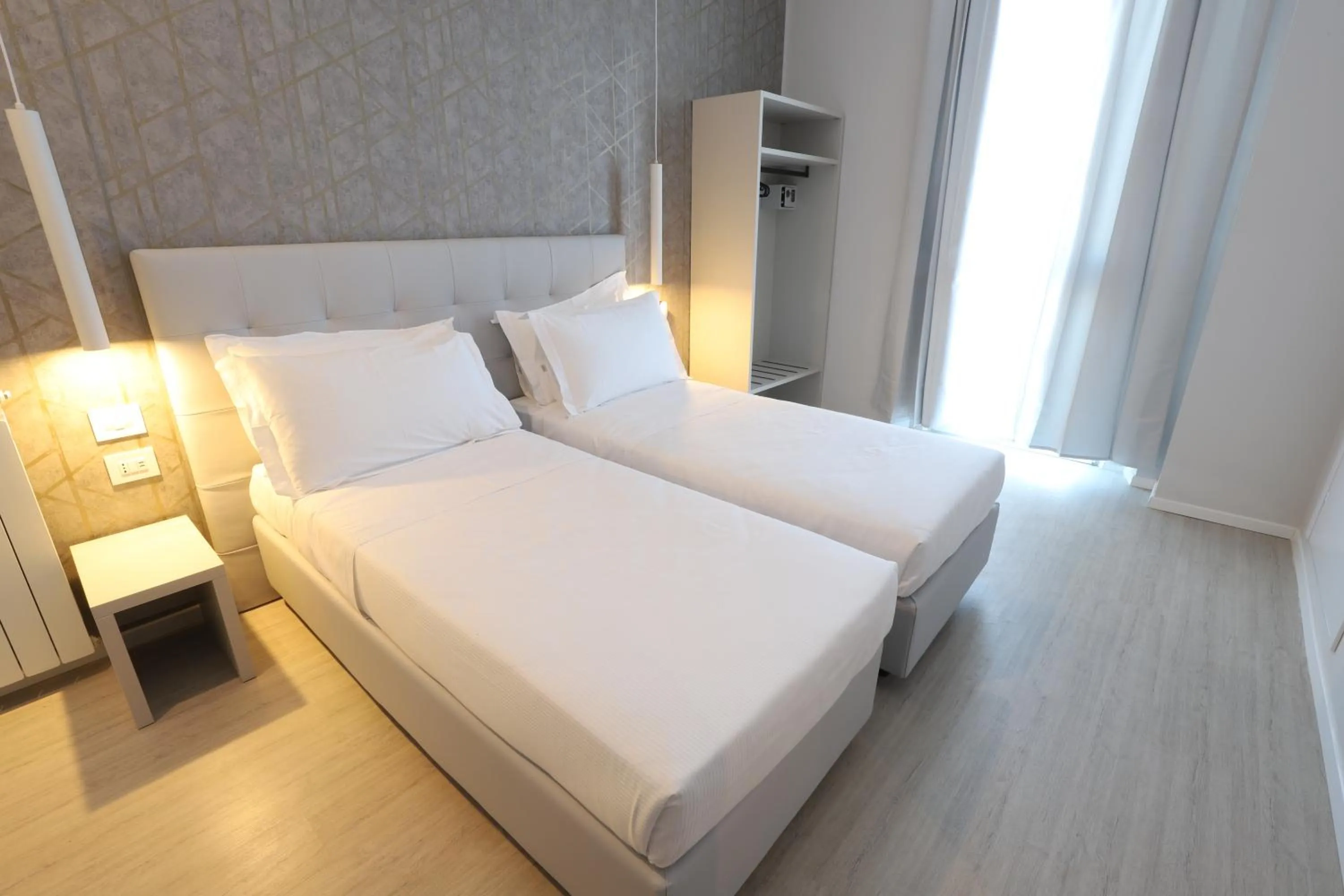 Twin Room in Cadorna Luxury Hotel