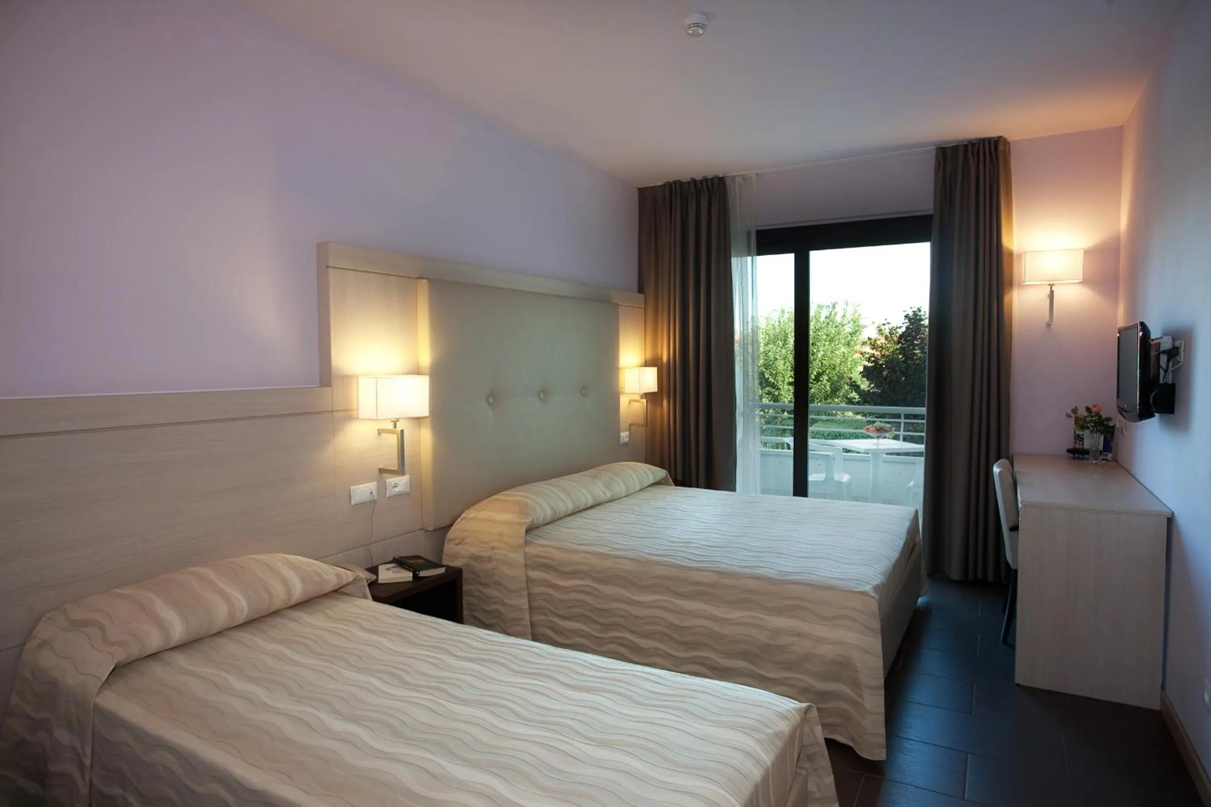 Superior Design Triple Room in Hotel Porto Azzurro