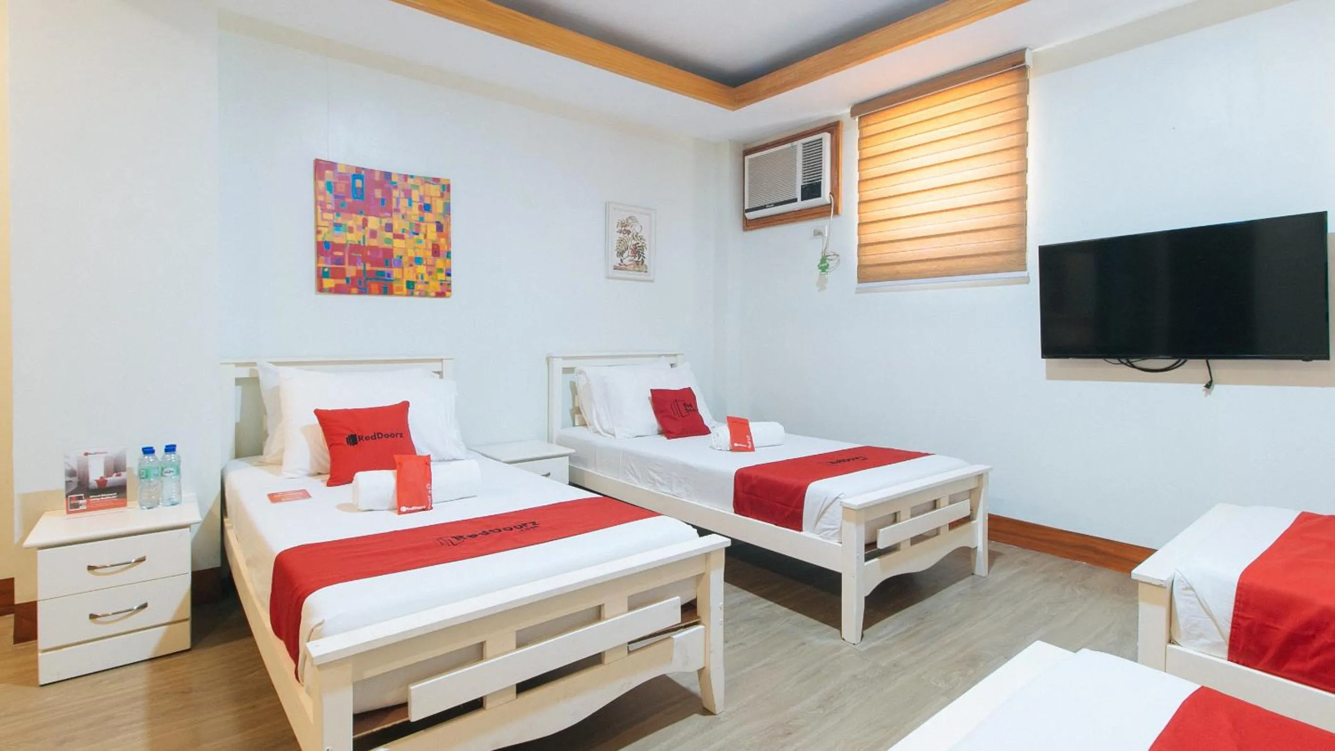 Quadruple Room in RedDoorz Premium @ Nick Hotel Gerona Tarlac