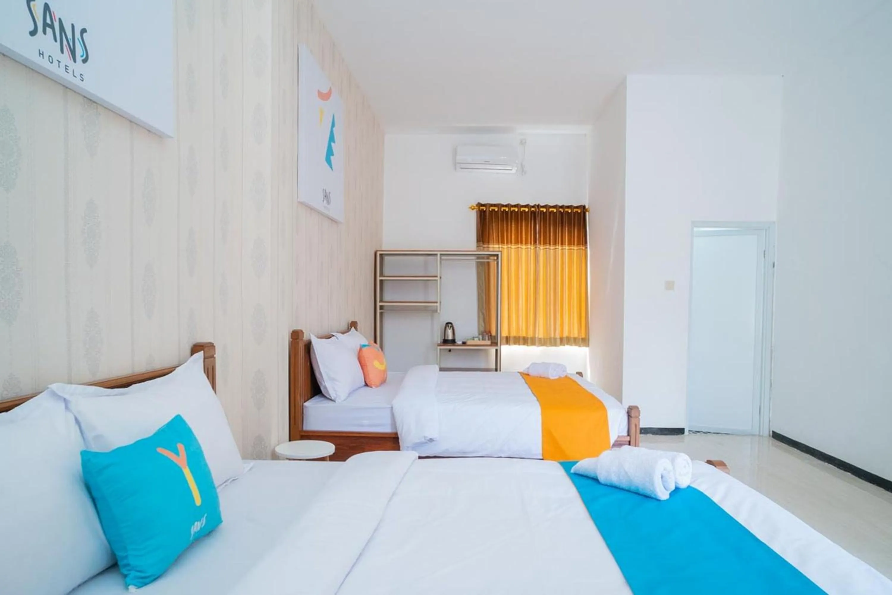 Family Room in Sans Hotel Queen Batu