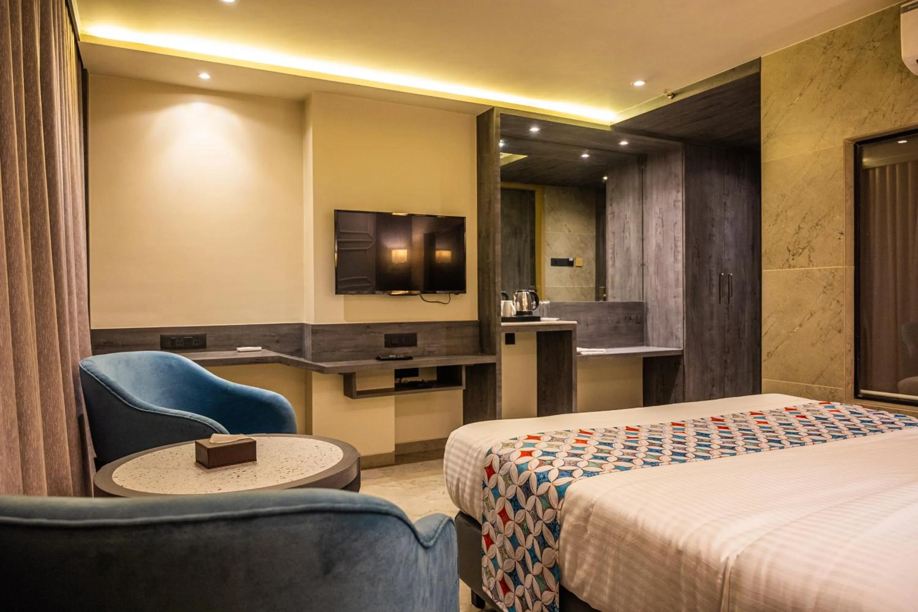 Queen Room in Suvidha Suites