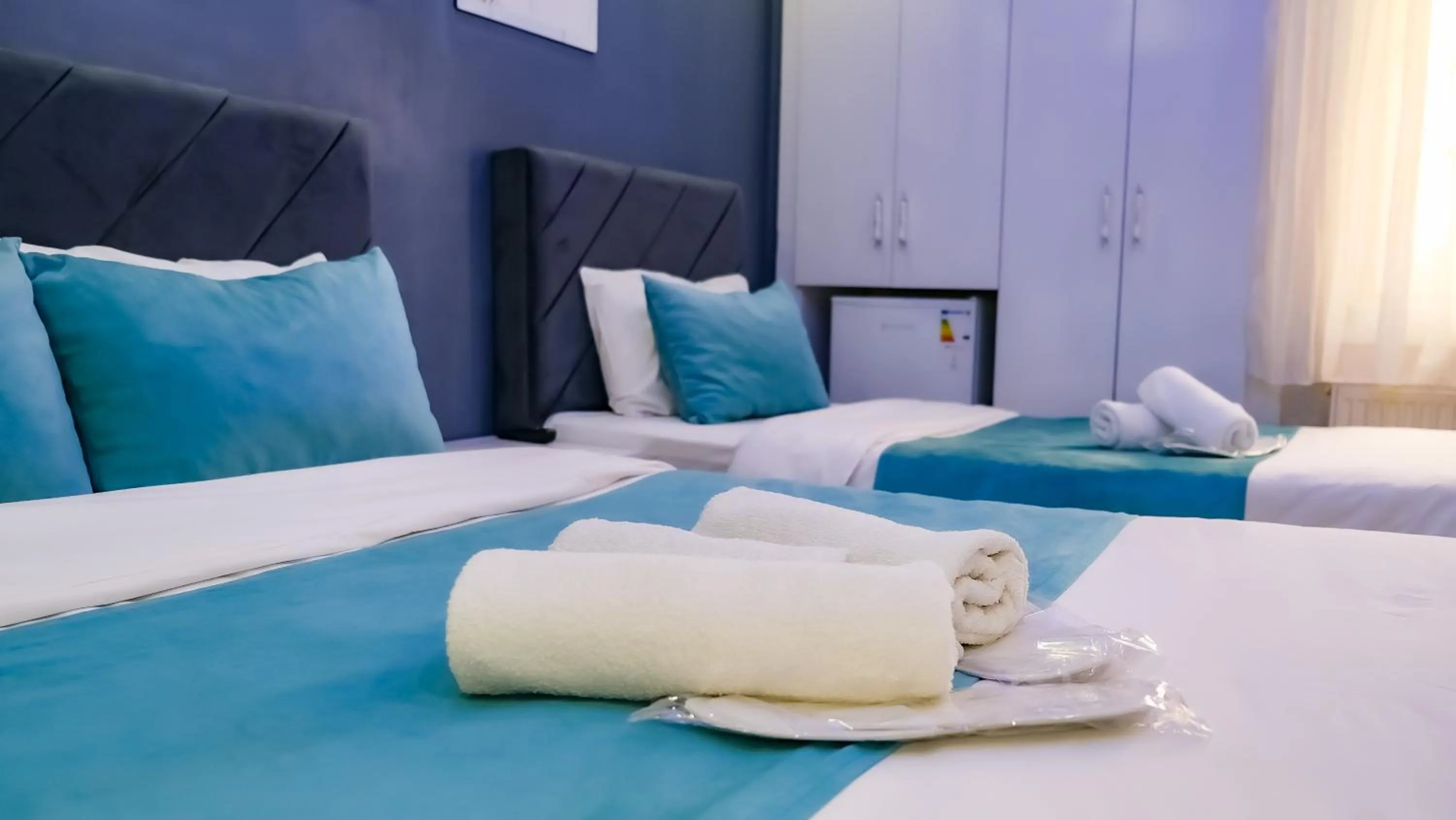 Deluxe Triple Room in Bona Sera Hotel