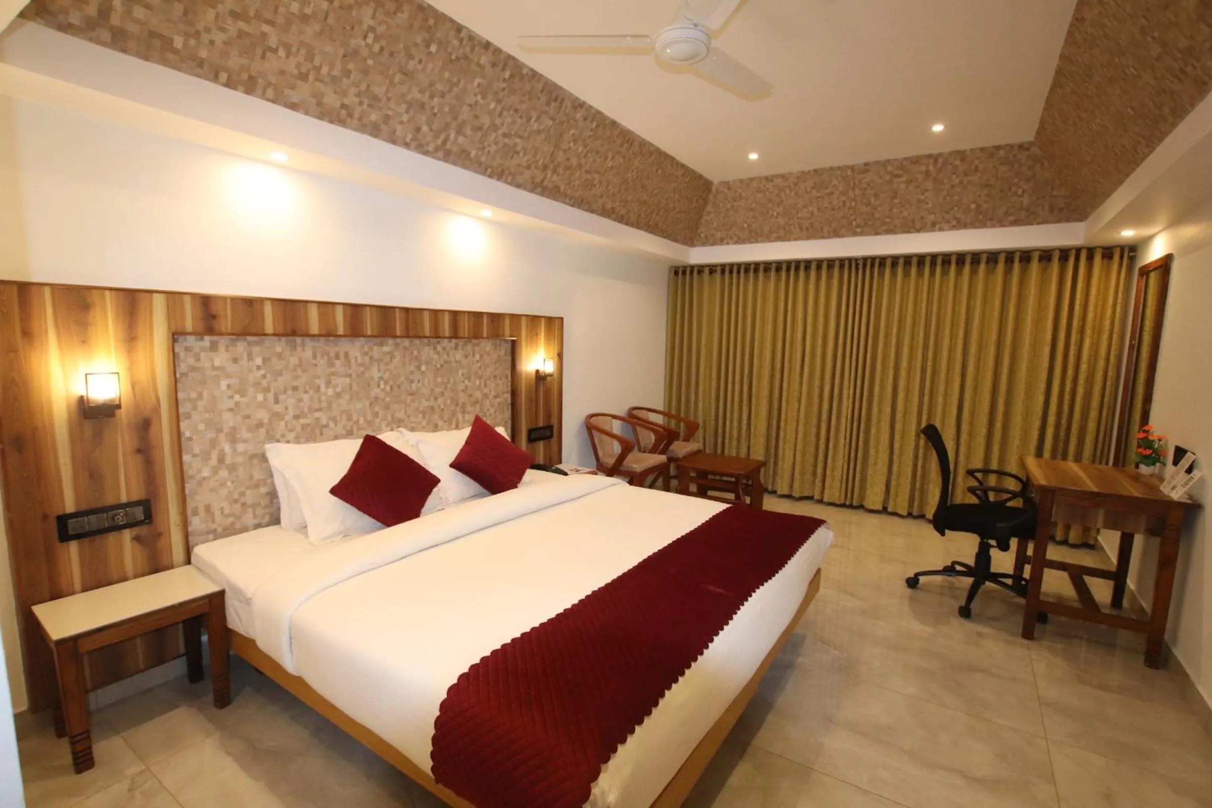 Queen Room with Balcony in Swagath Holiday Resort