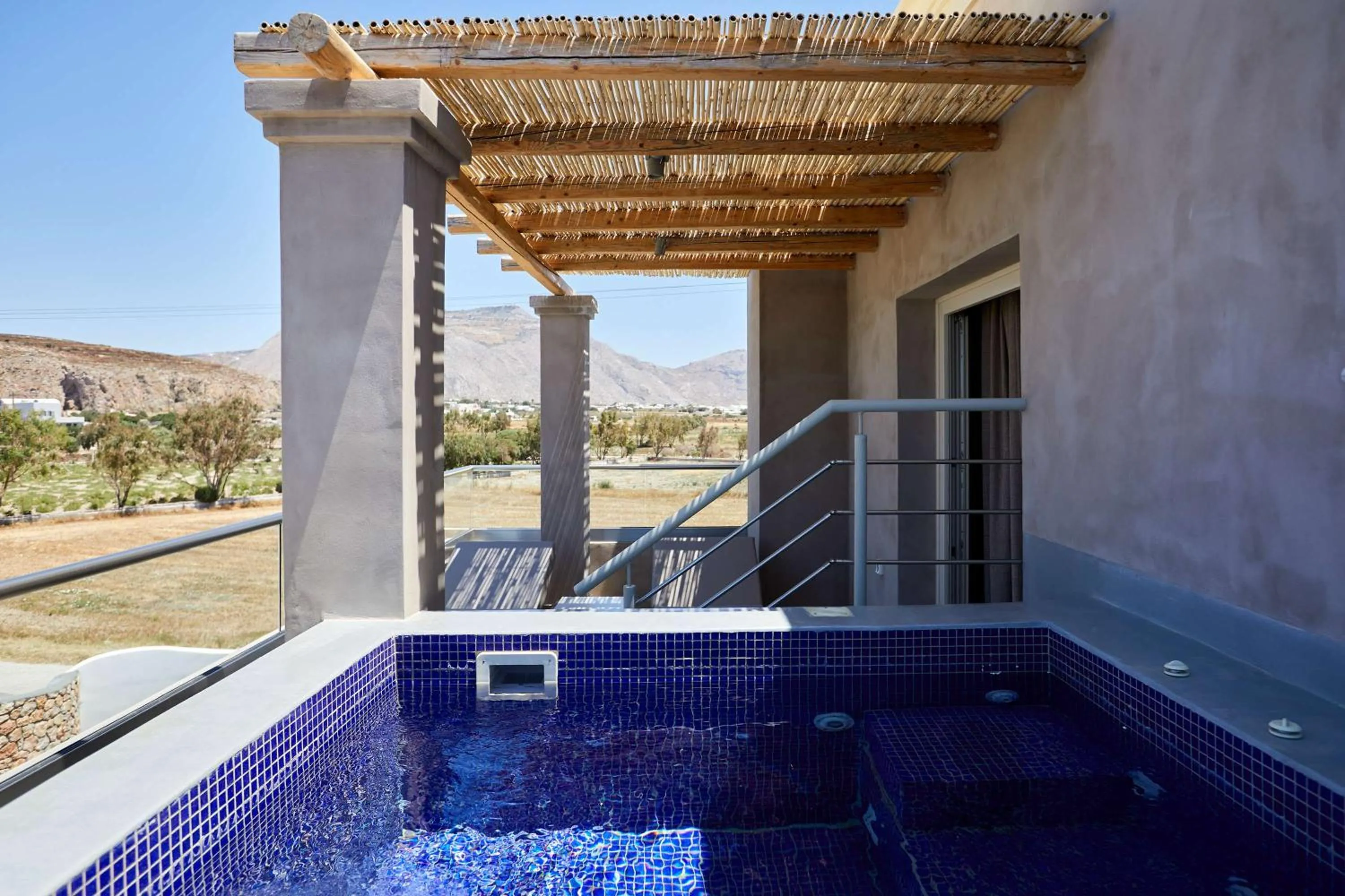 King Junior Suite with Hot Tub in Sea Breeze Santorini Beach Resort, Curio By Hilton