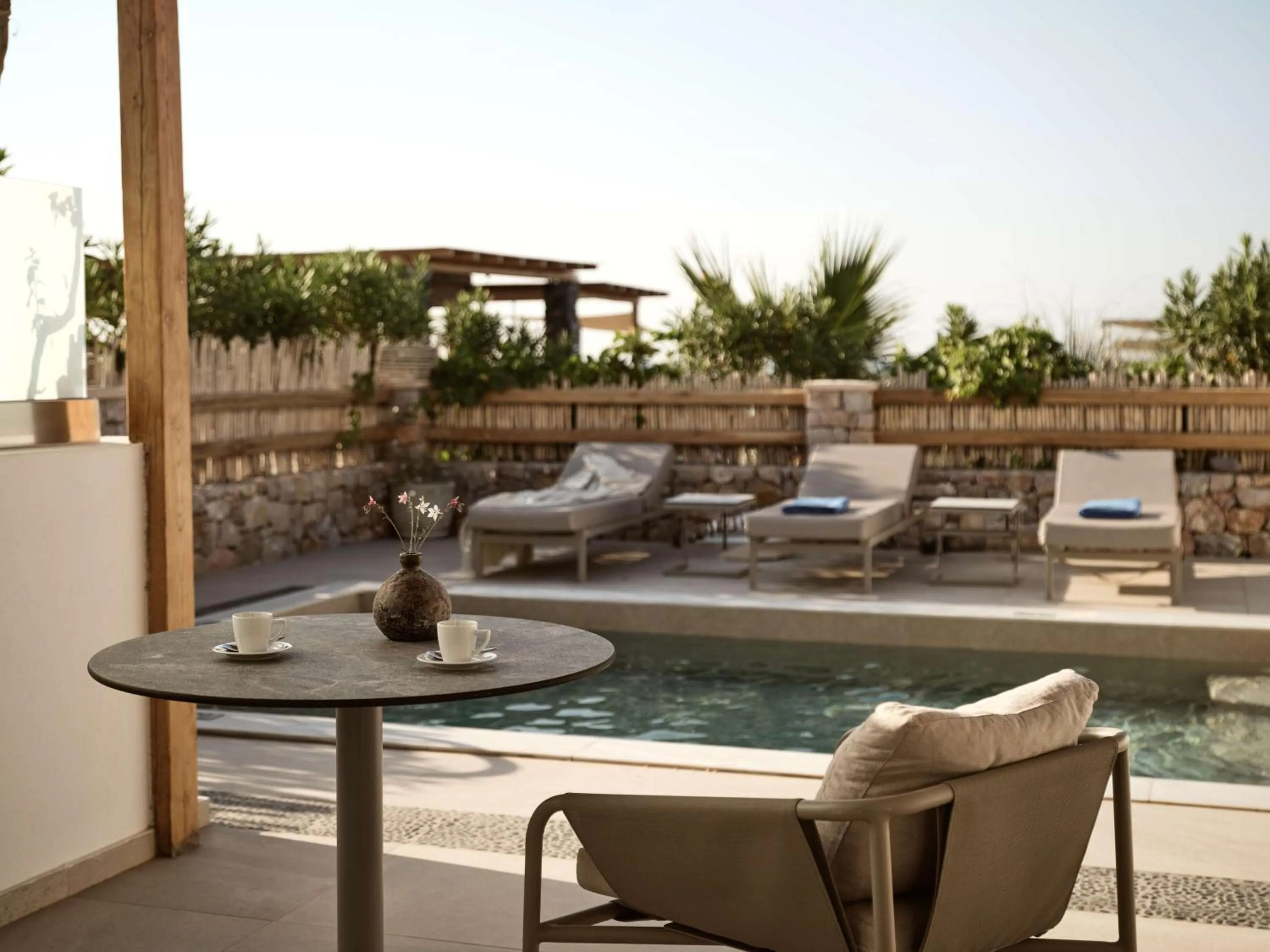 King Premium Duplex Suite with Pool and Sea View in Sea Breeze Santorini Beach Resort, Curio By Hilton