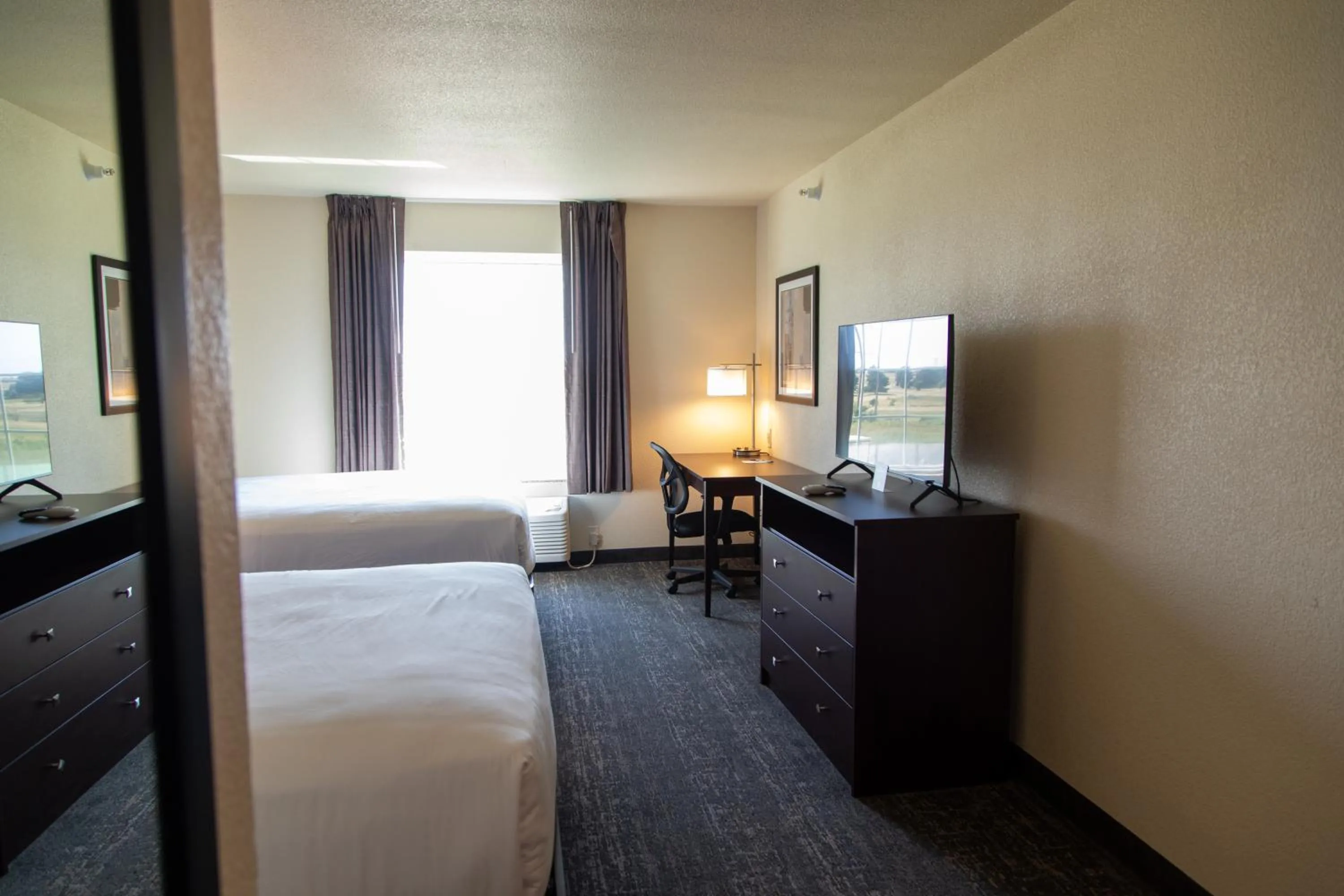 Queen Room with Two Queen Beds in Cobblestone Inn & Suites -Springfield