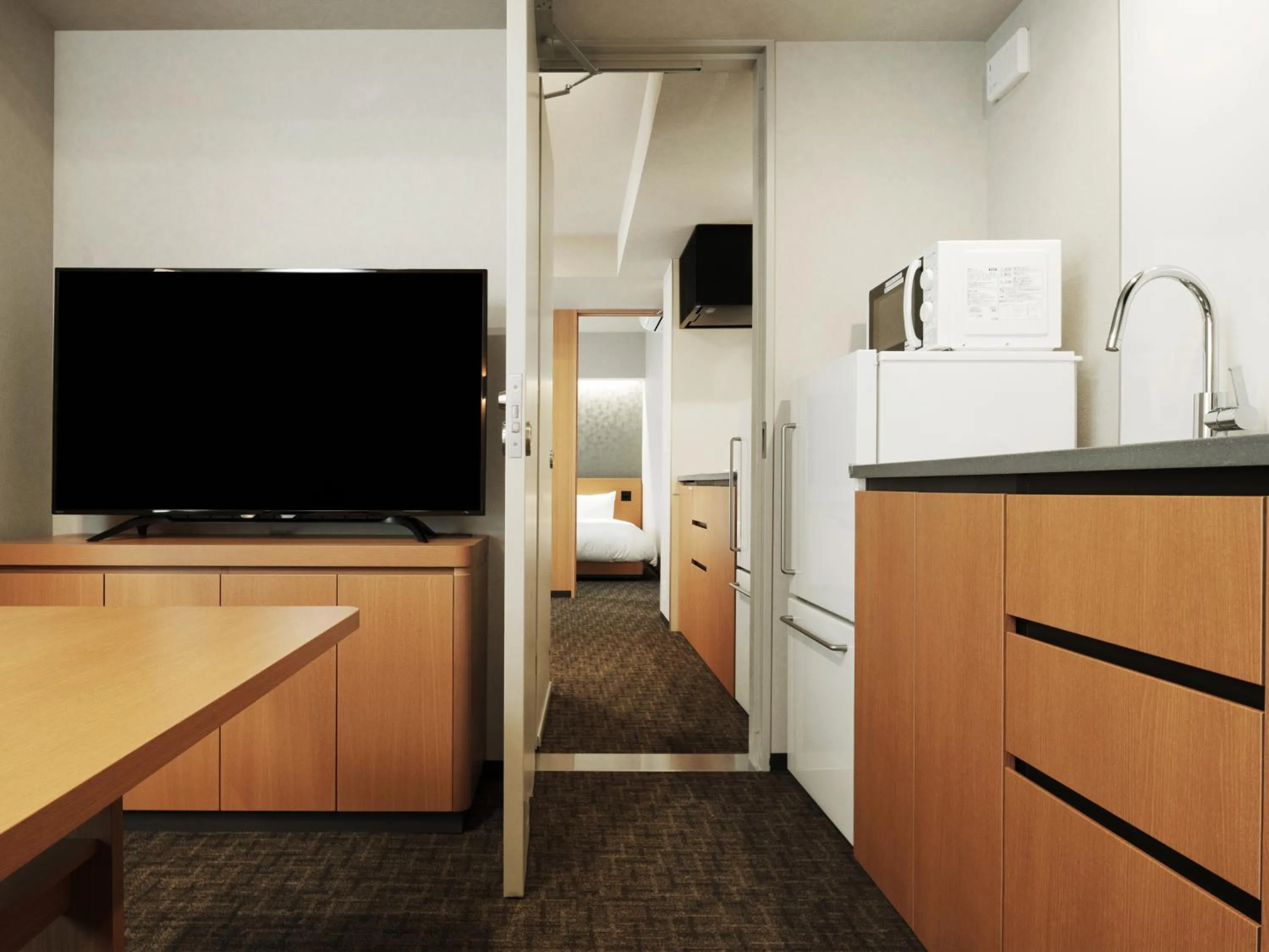Connecting Two-Bedroom Apartment(8 Single-Beds) in MIMARU Tokyo Station East