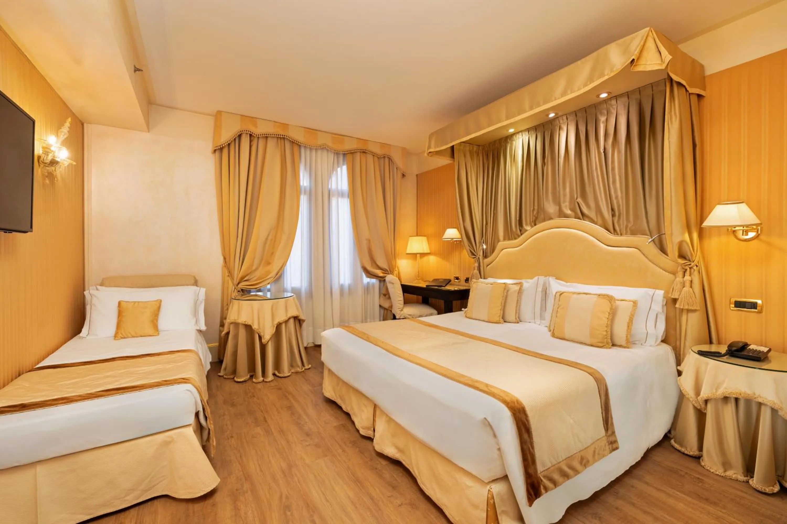 Deluxe Triple Room in Hotel A La Commedia