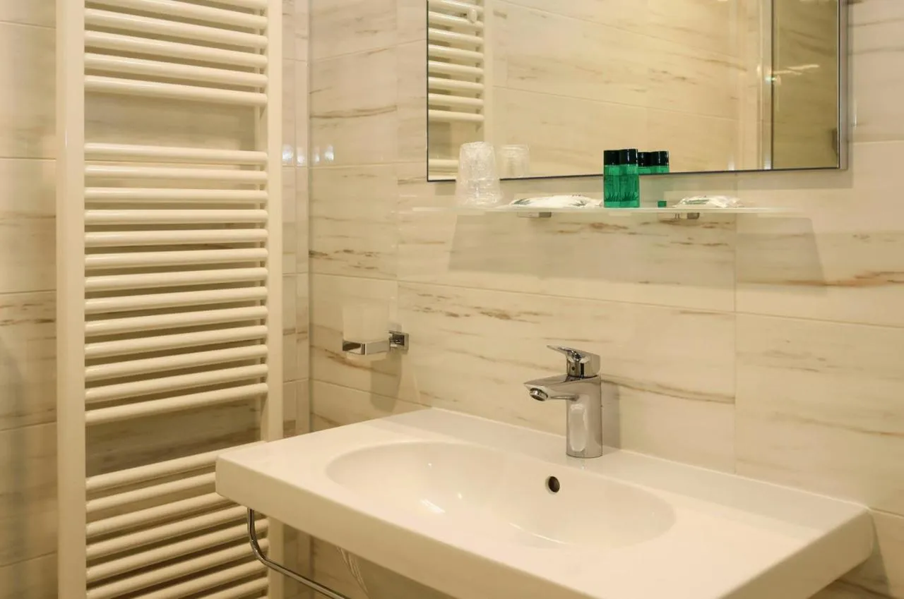 Quadruple Room in Dama Hotel