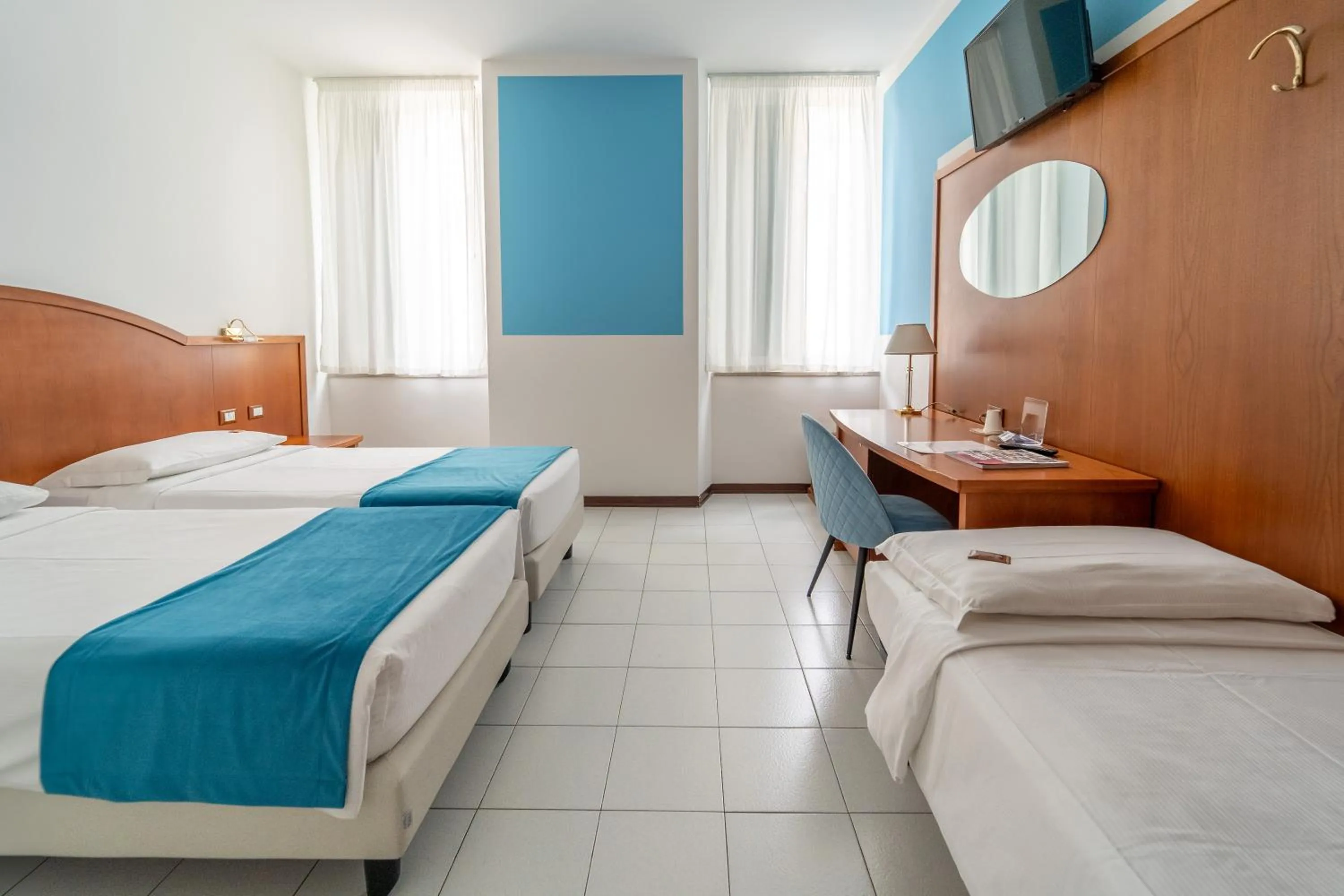 Quadruple Room in Hotel Italia