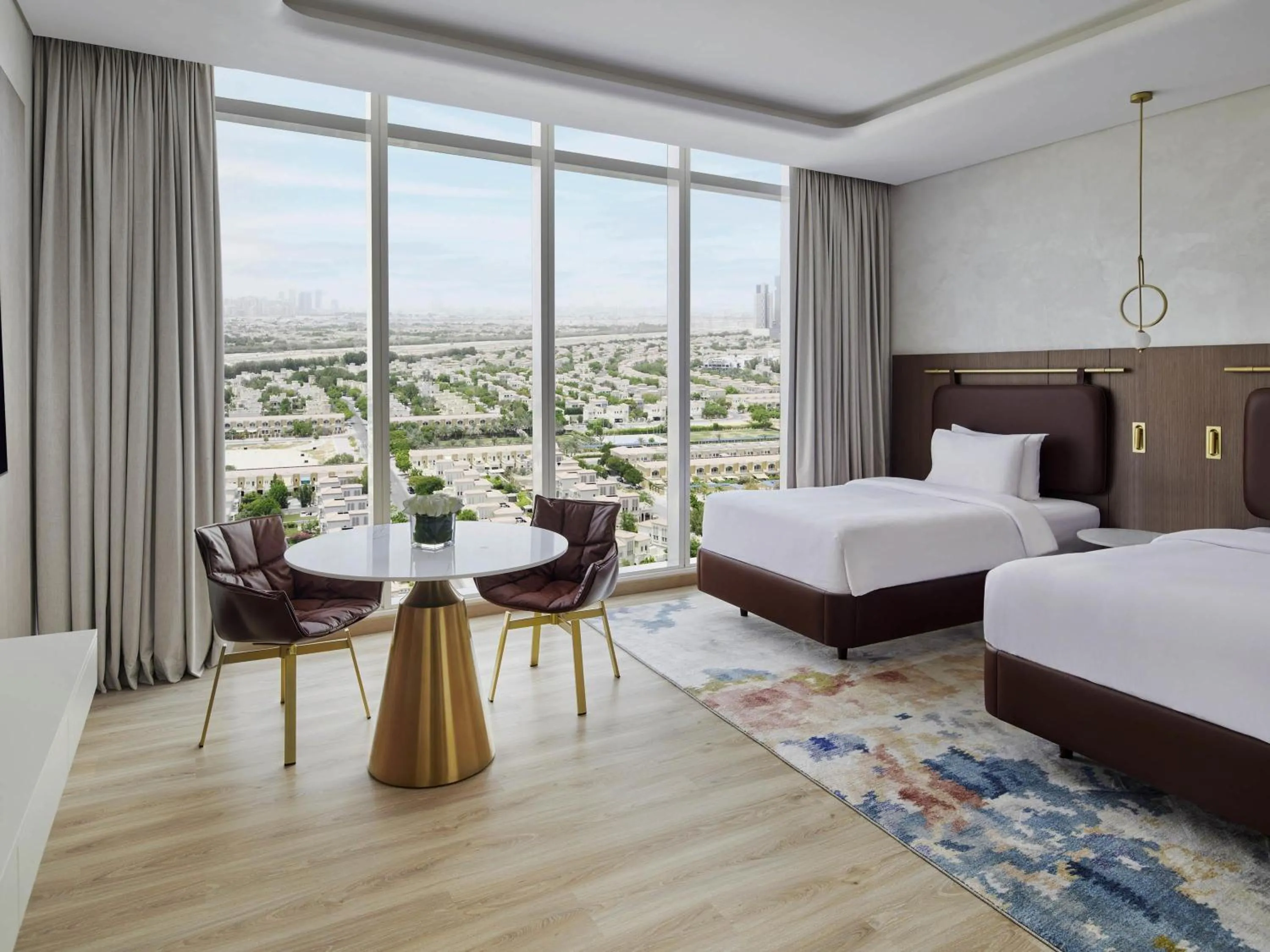 Deluxe Twin Room with Panoramic City View (Free Shuttle to the Beach, Mall & Metro Station) in Movenpick Jumeirah Village Triangle