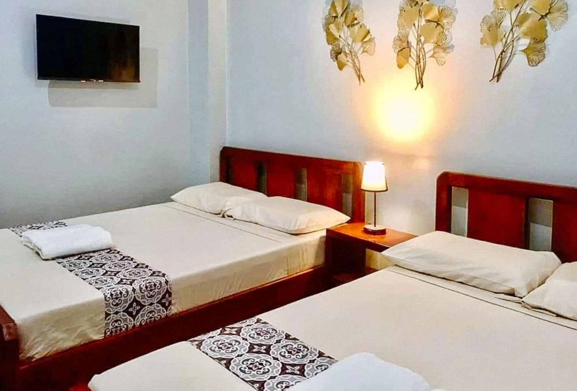 Quadruple Room in RedDoorz at Gracia's Calzada Inn Camiguin