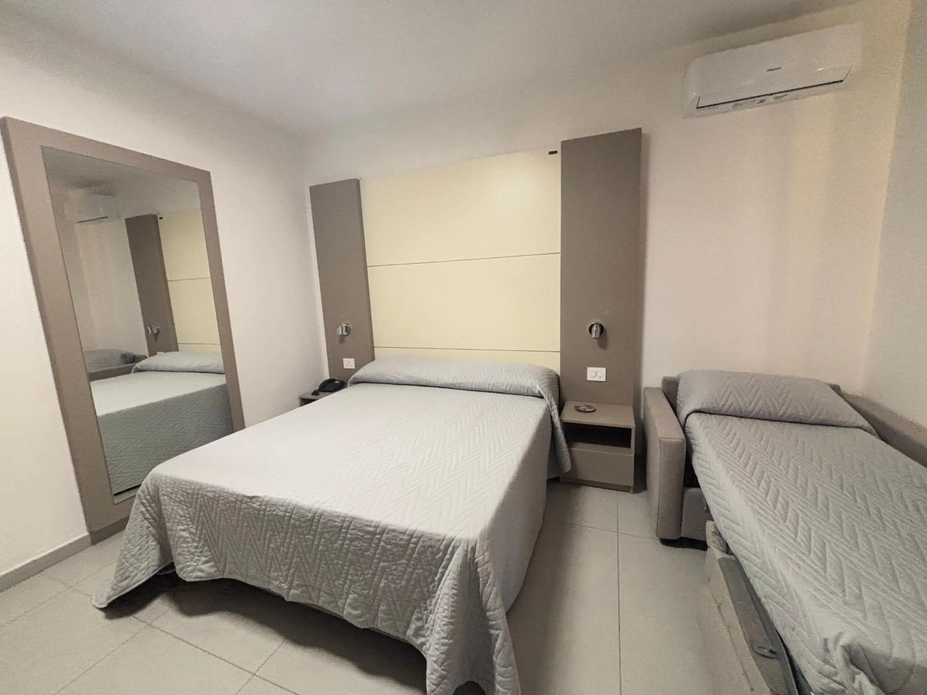 Deluxe Triple Room in Hotel La Mela