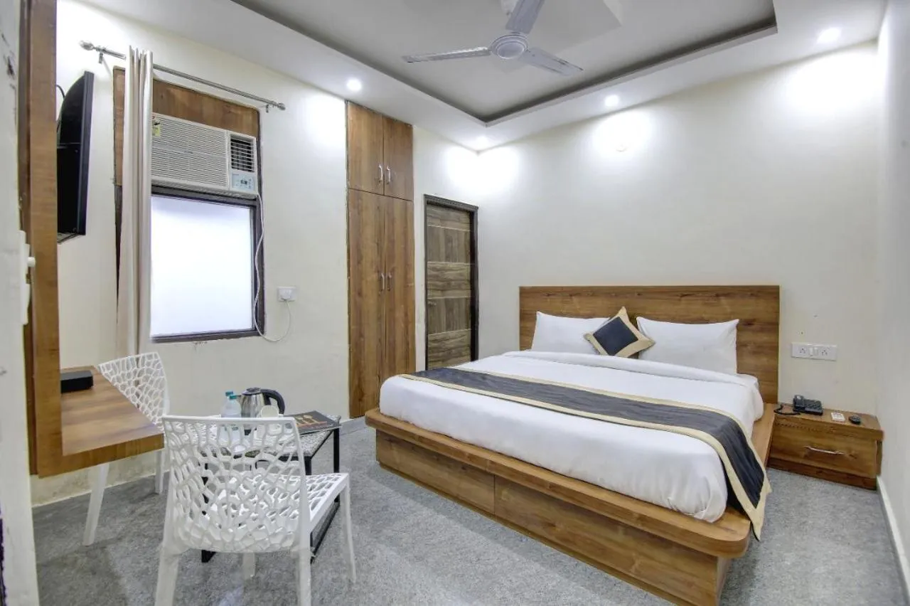 Deluxe Room (2 Adults + 1 Child) in Hotel Premier Noida 135