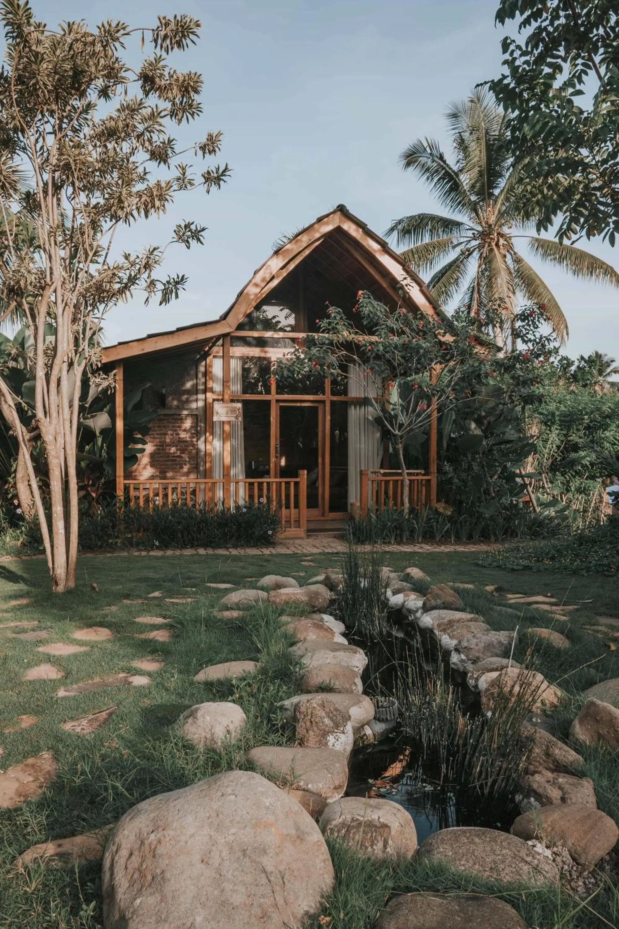 Wood Cabin Garden View with Free Scheduled Yoga Class (on Saturday) in Kusfarm Bali by AHM