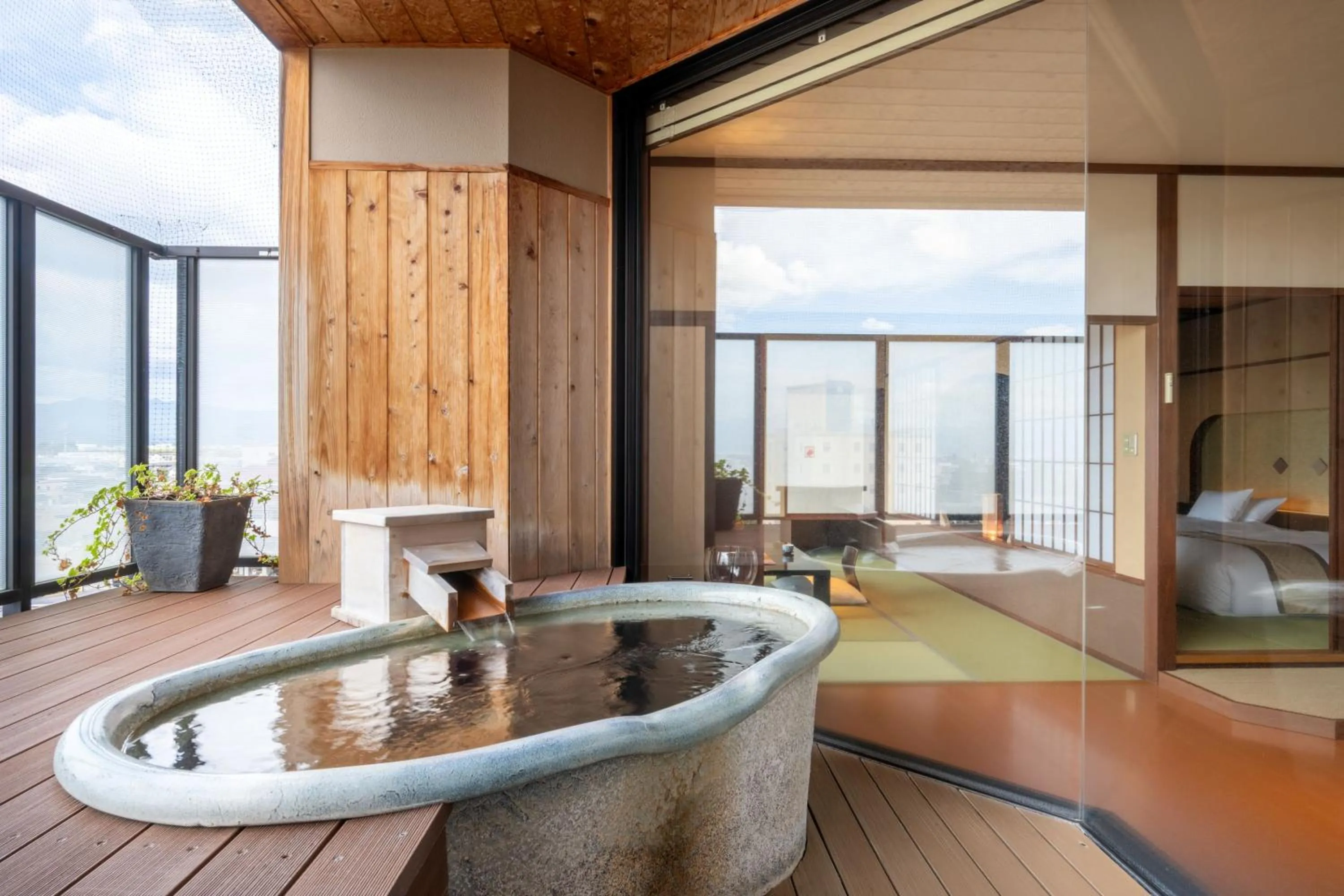 Deluxe Room with Tatami Area with Open-Air Bath in Takinoyu Hotel