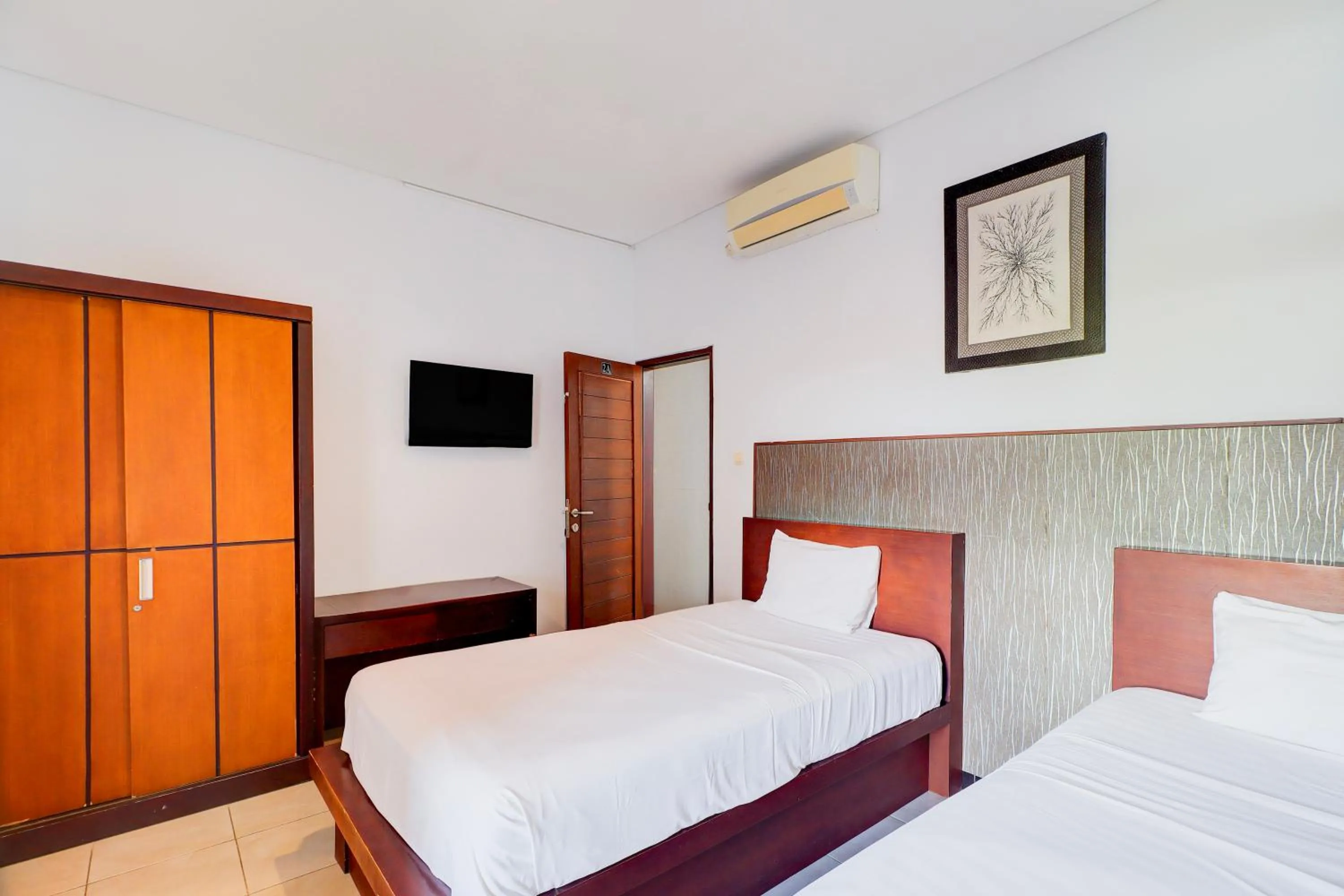 Deluxe Twin Room in Collection O Bali near Keonganan Beach formerly New Asta Graha Homestay
