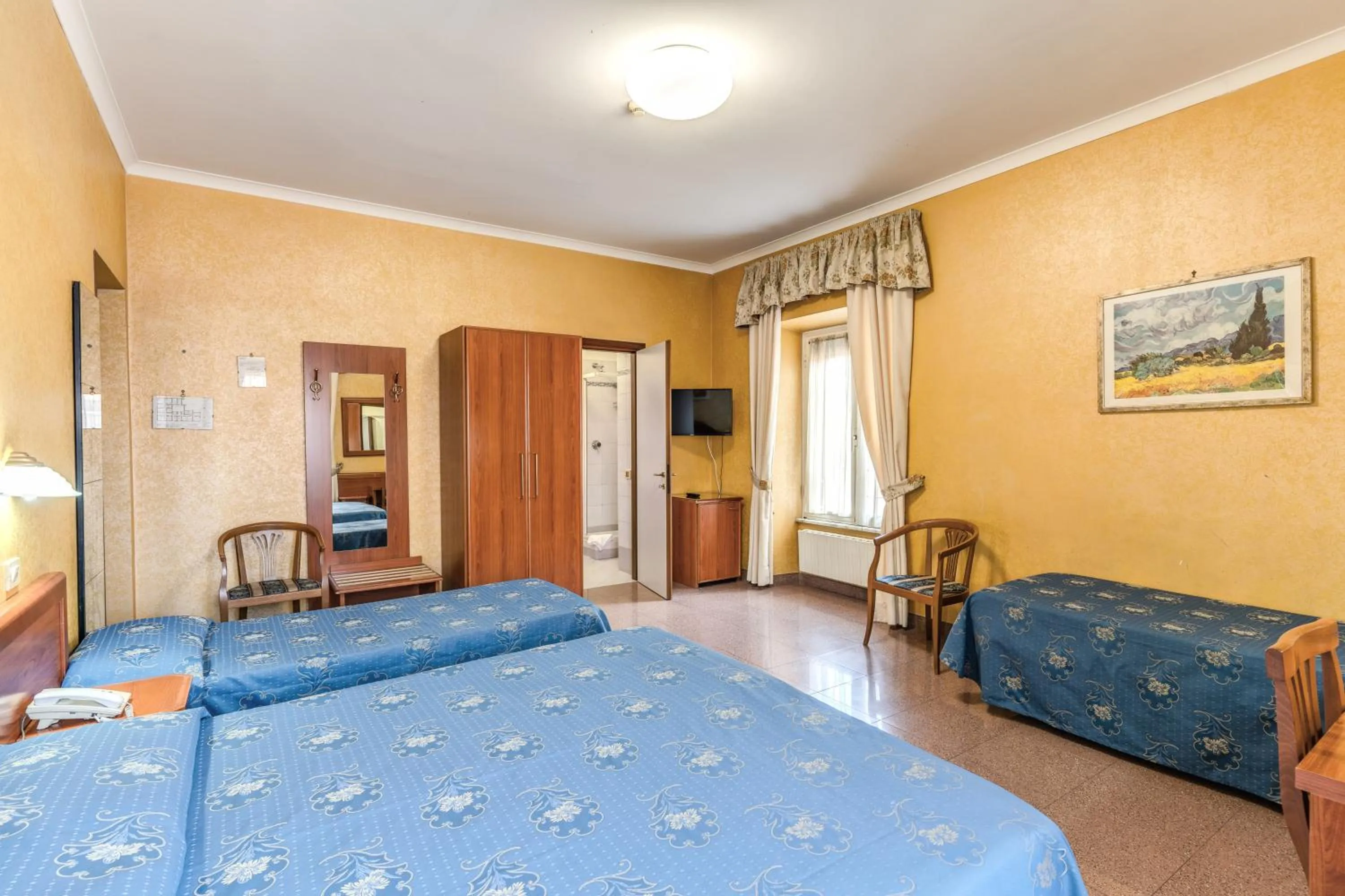 Quadruple Room in Hotel Milo