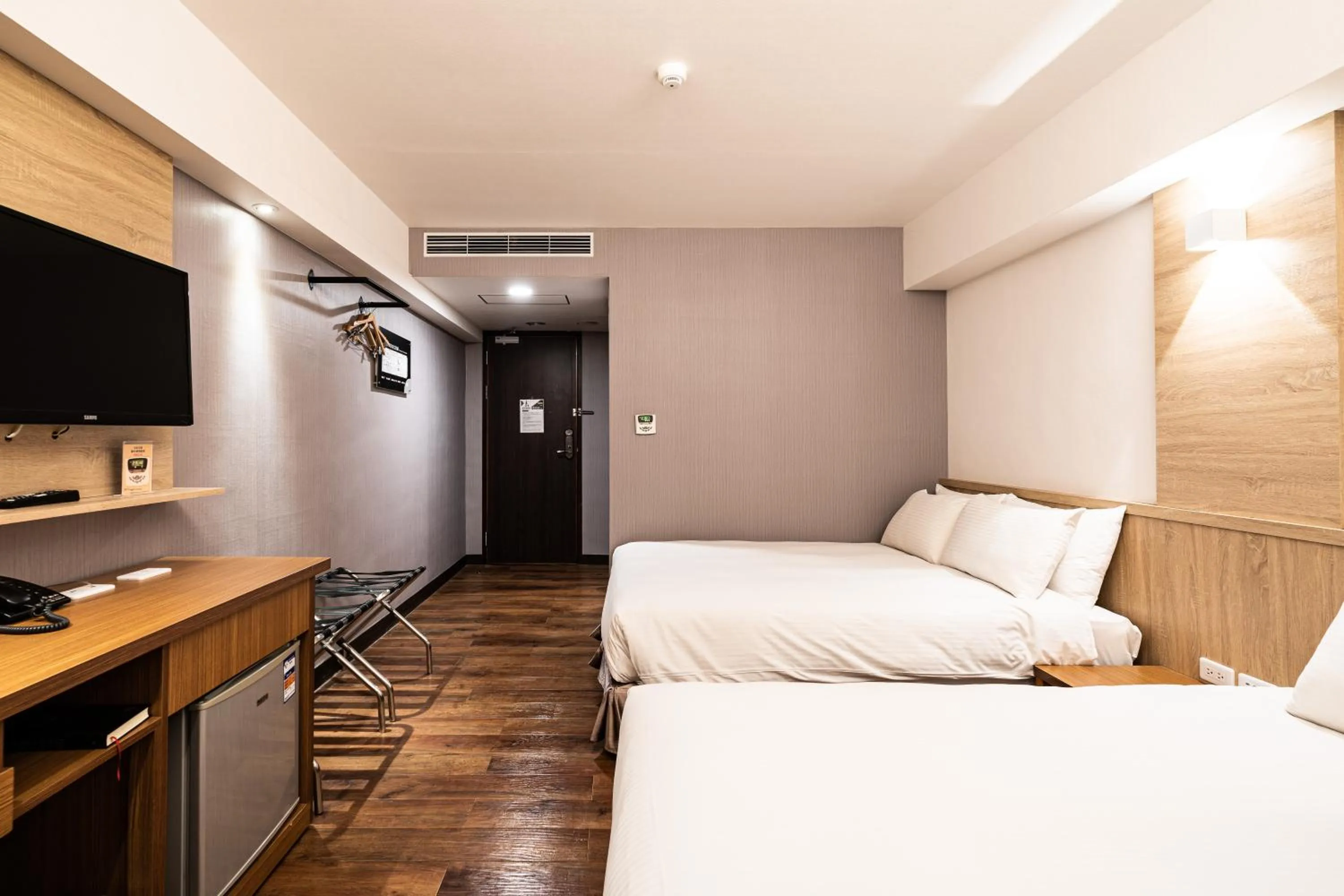 Standard Quadruple Room in Global Traveler Hotel