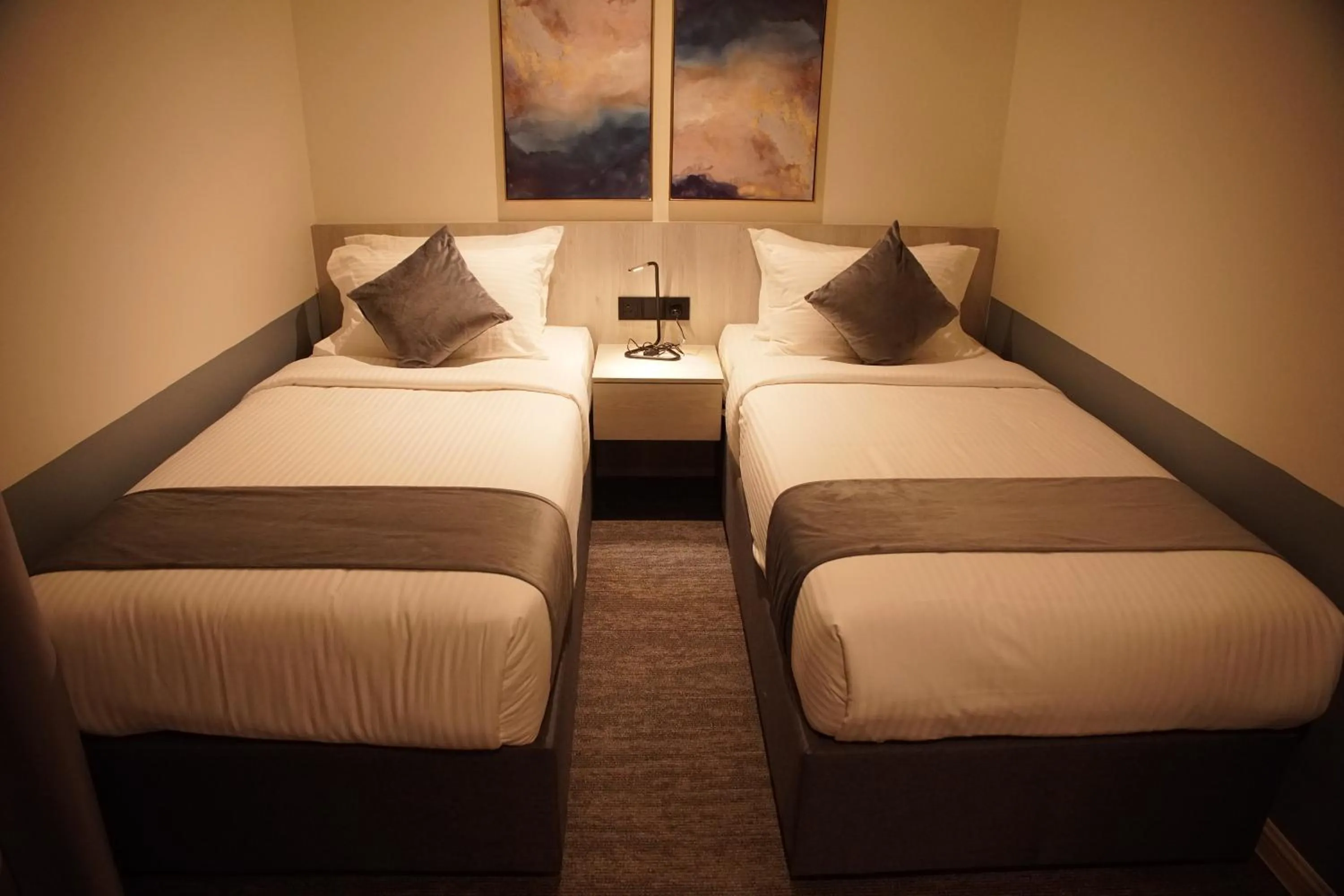 Twin Room in Dê MOCCIS Boutique Hotel