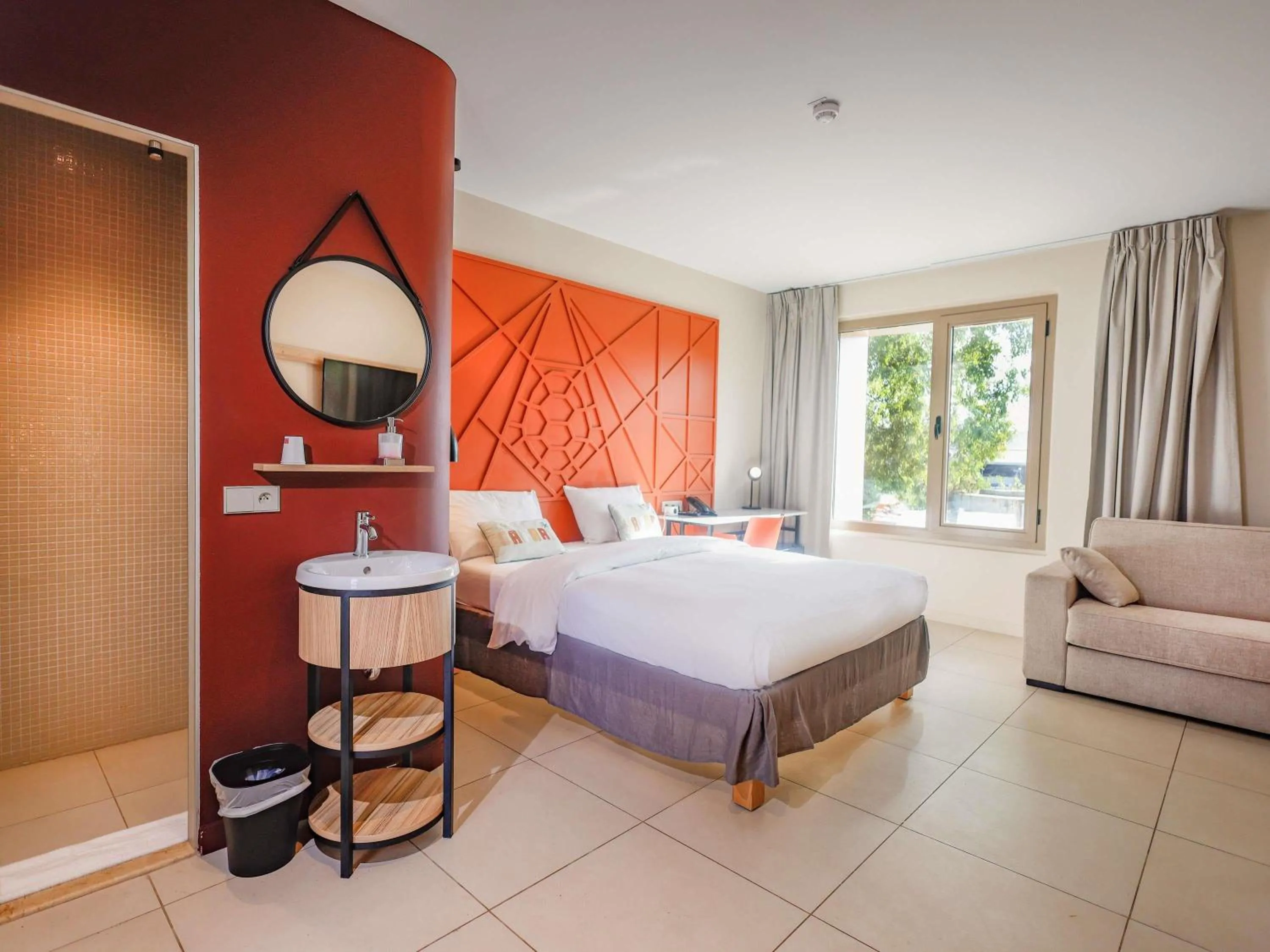 Superior Room with One Double Bed and One Single Bed - Lagoon View in Ibis Styles Mayotte Aéroport
