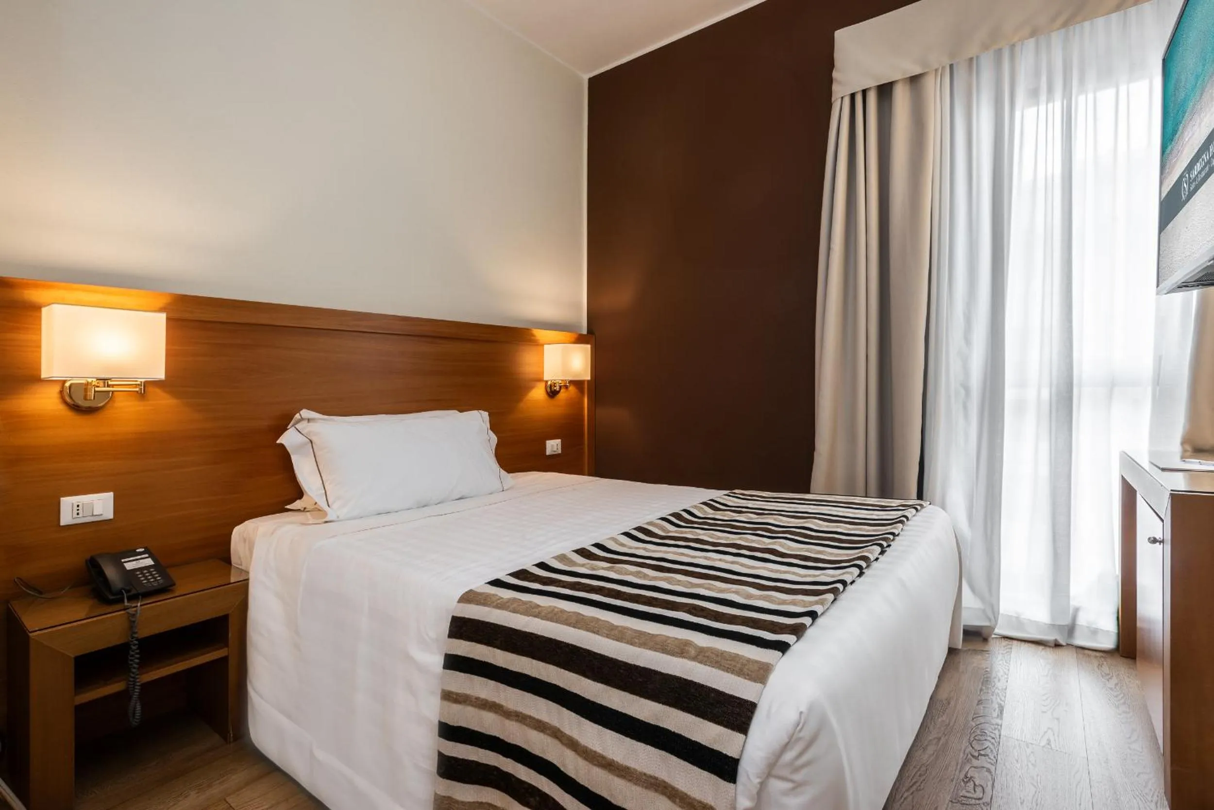 Single Room in Sardegna Hotel - Suites & Restaurant
