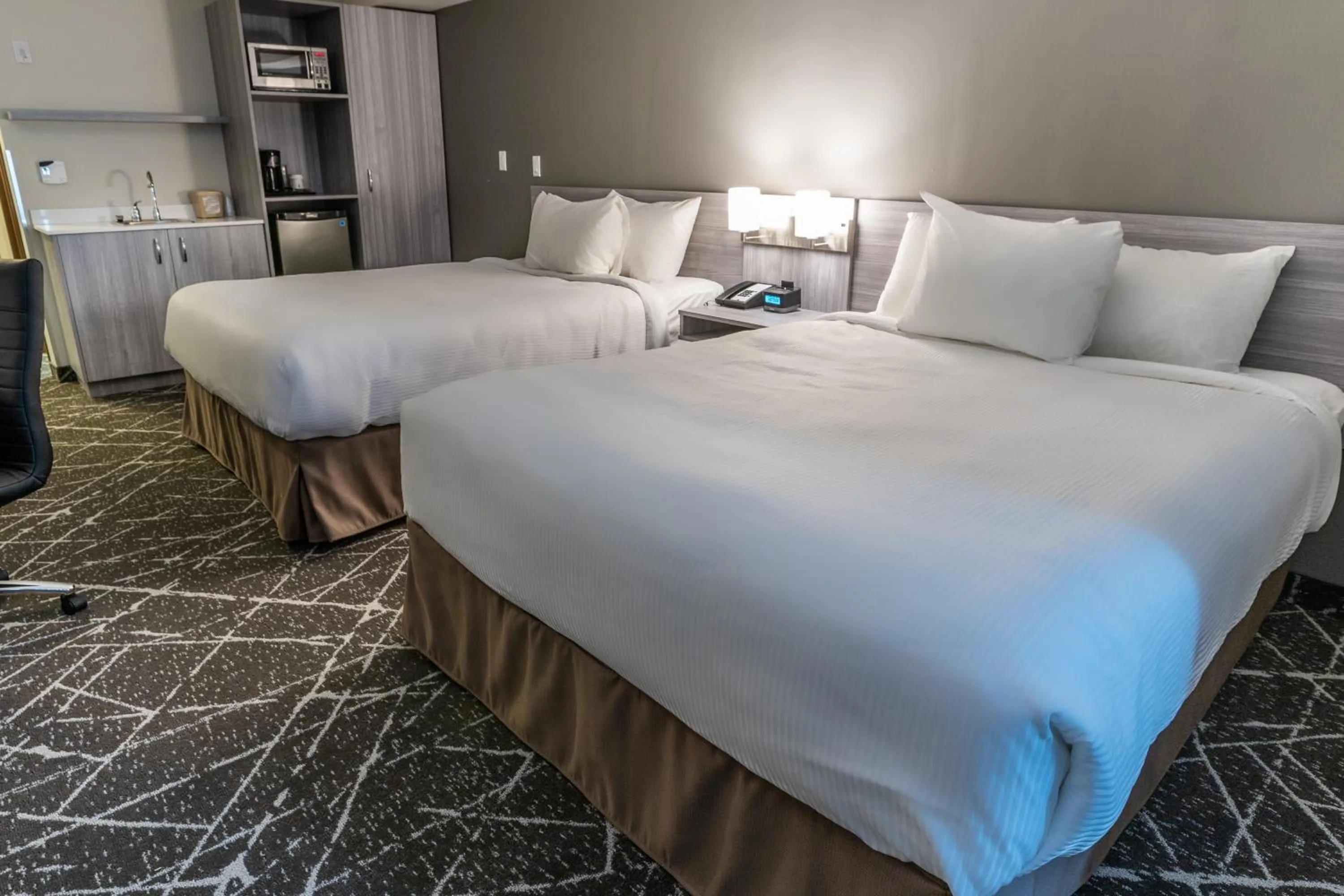 Business Queen Room with Two Queen Beds - Non-Smoking in Microtel Inn & Suites by Wyndham Lloydminster