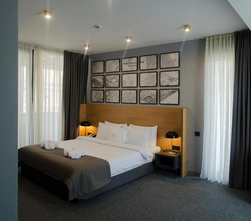 Quadruple Room with Terrace in Hotel Tuta