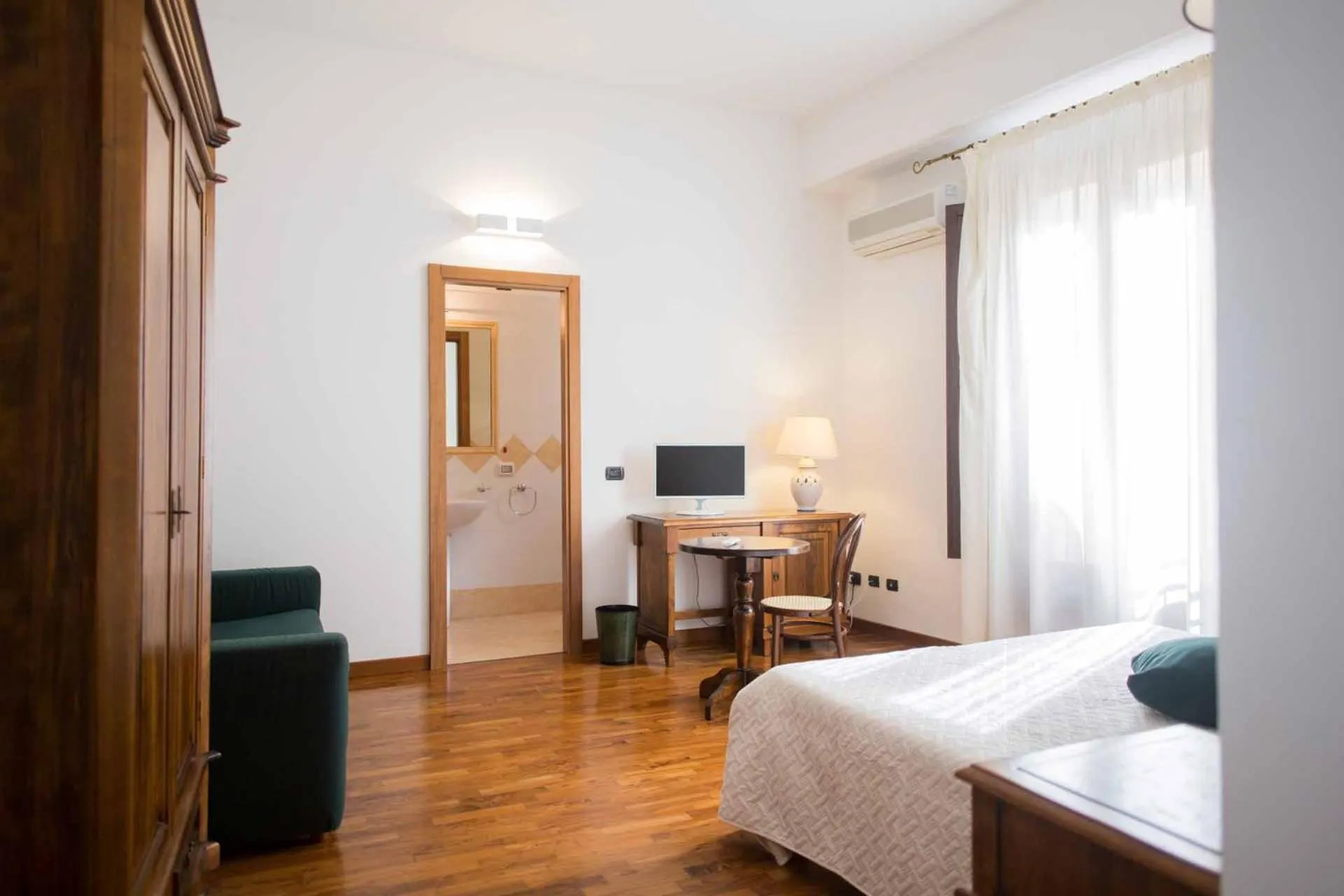 Classic Quadruple Room in Hotel La Piazzetta