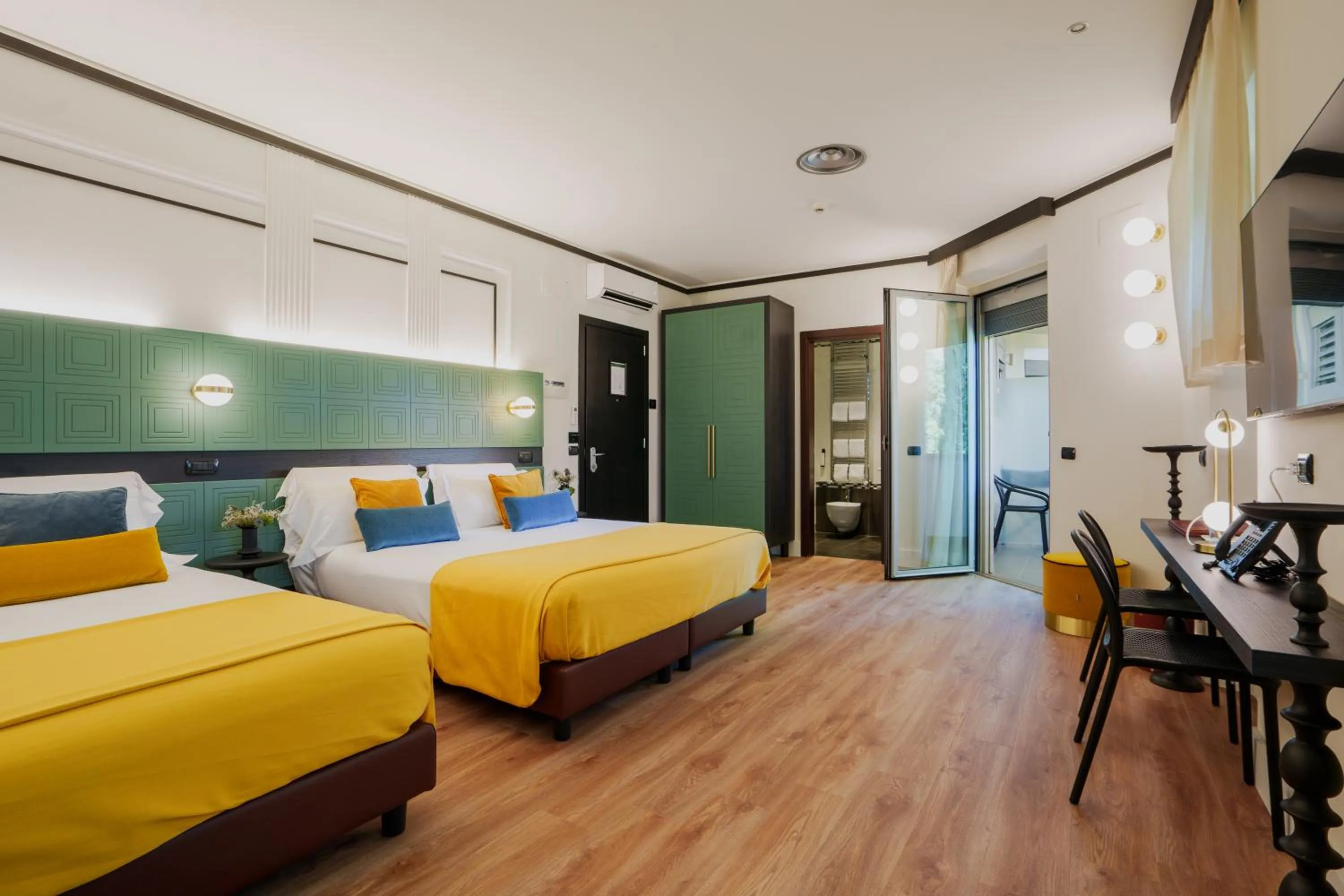 Deluxe Quadruple Room in JOIVY Together Florence Urban Resort