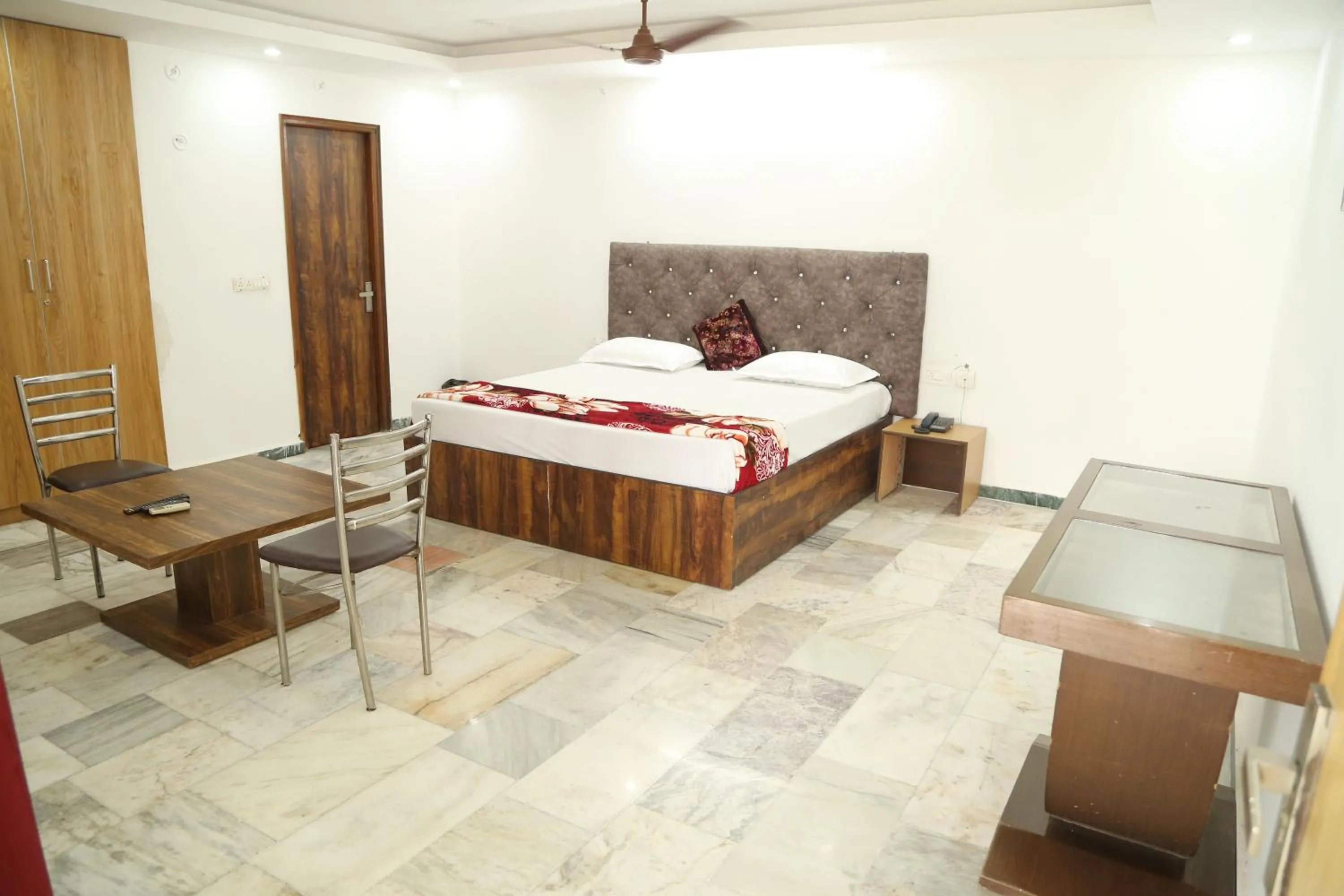 Superior King Room - single occupancy in Shanti Residency