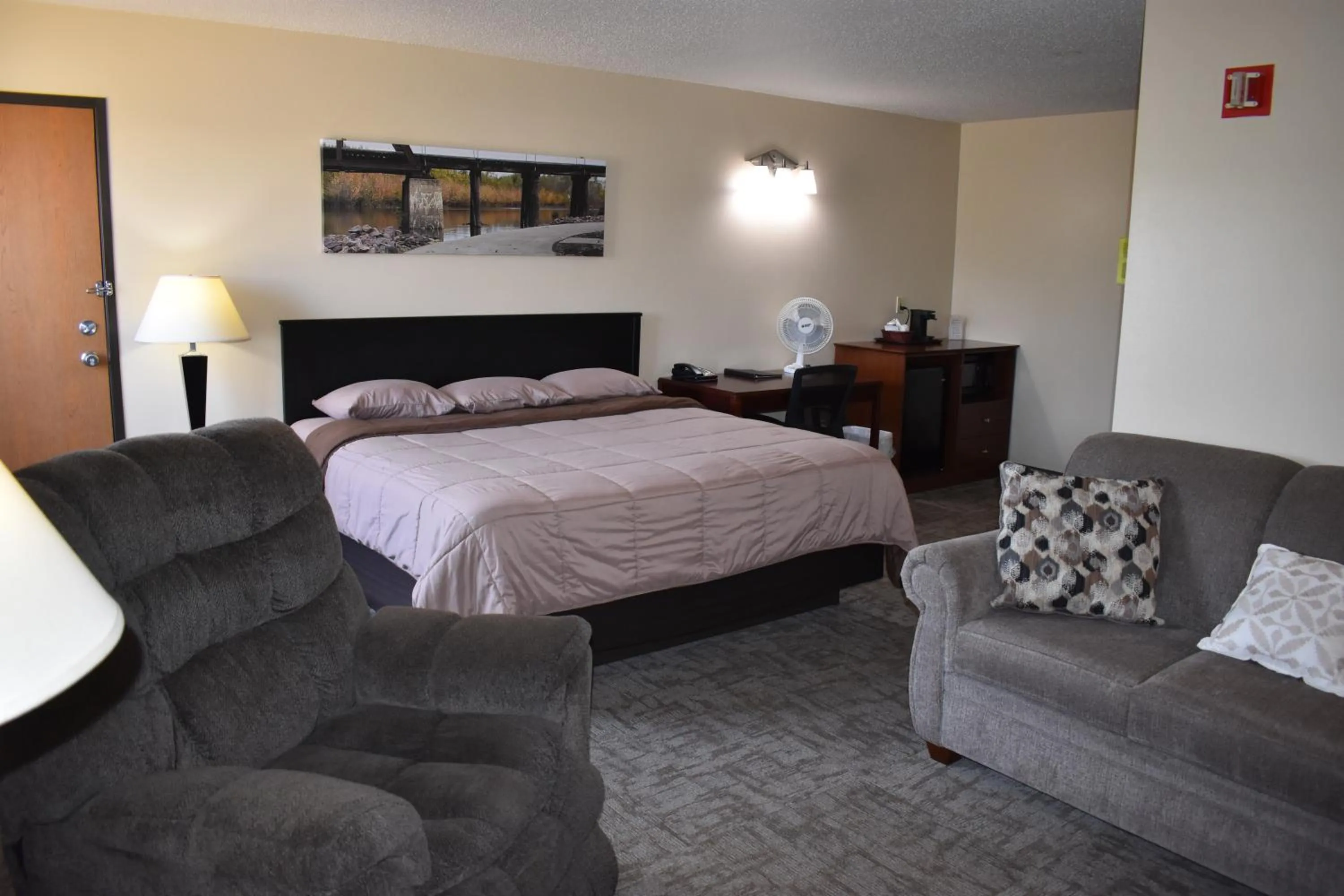 Deluxe King Suite - single occupancy in Heartland Hotel & Suites