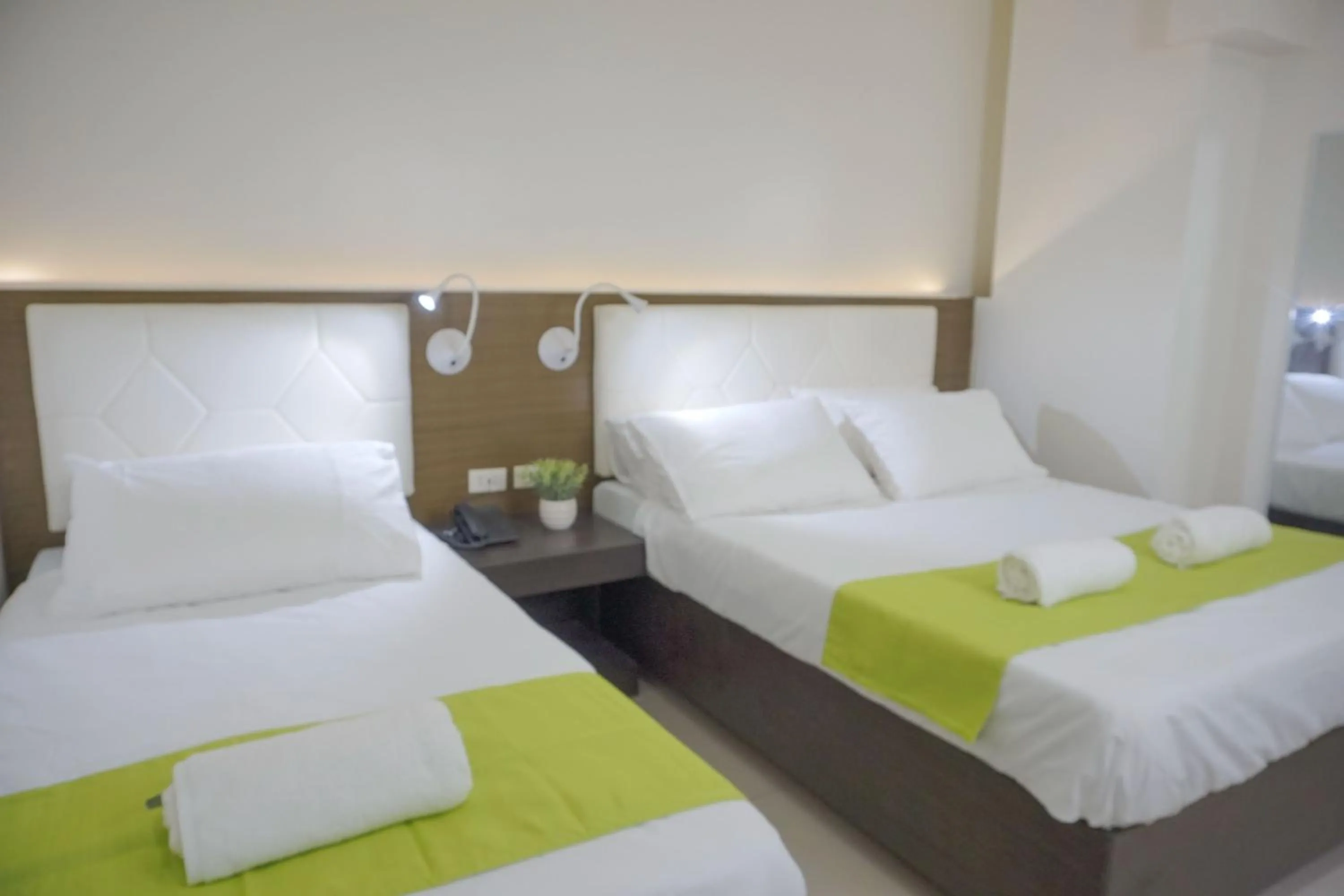 Deluxe Triple Room in Benrose Hotel
