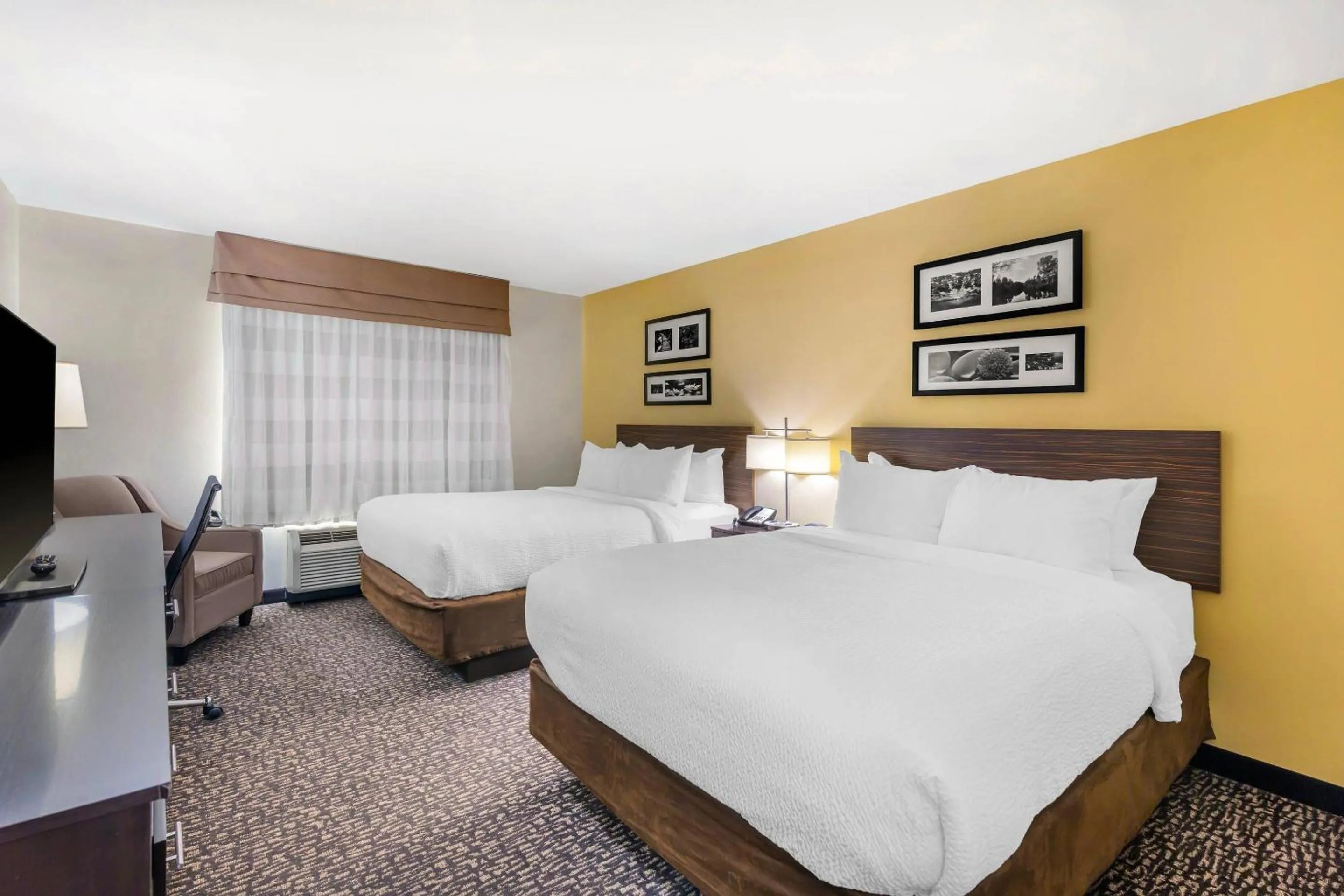 Queen Room with Two Queen Beds in Sleep Inn & Suites Devils Lake