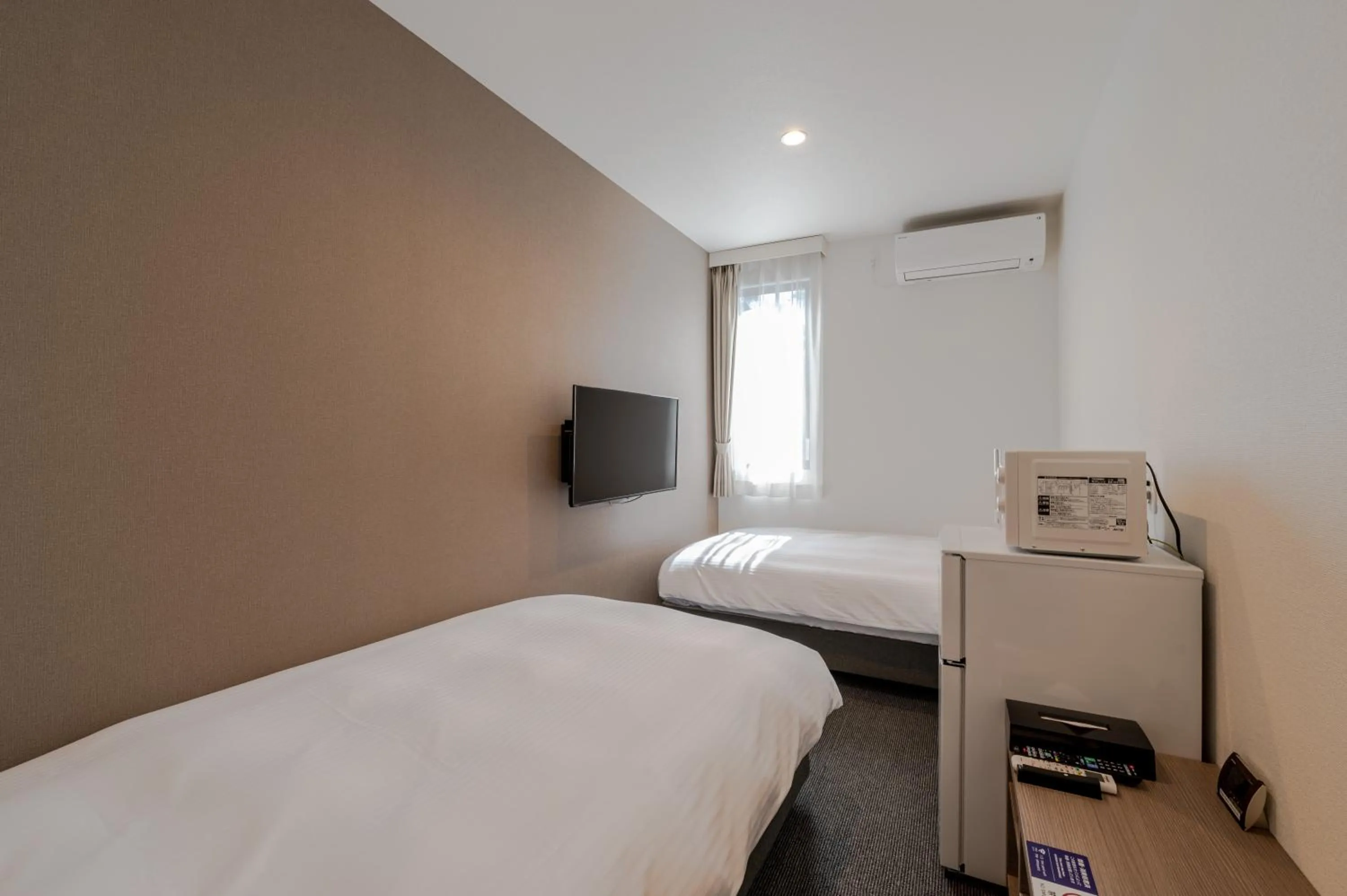 Standard Twin Room - single occupancy in HOTEL R9 The Yard Buzen