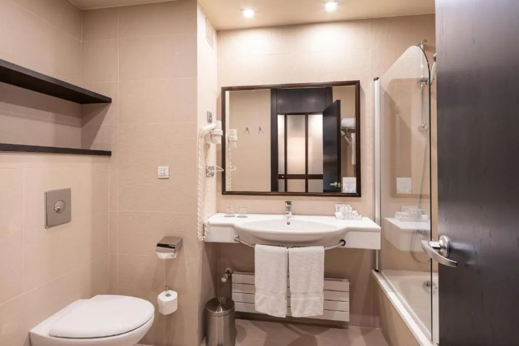 Twin Room with Extra Bed (3 Adults) in Attica21 Coruña