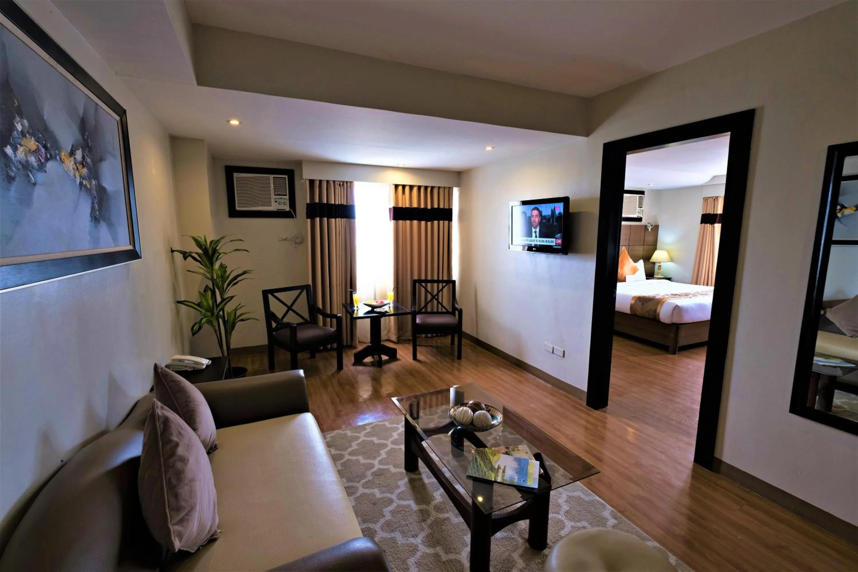 Executive Suite in The Pinnacle Hotel and Suites