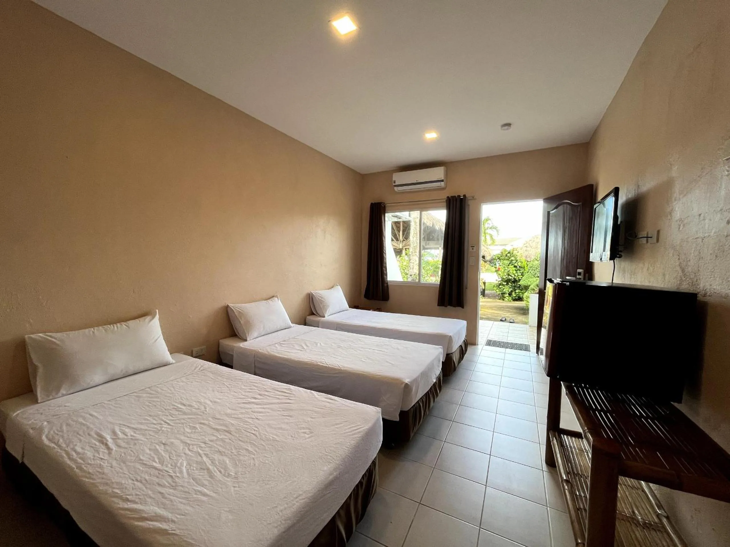 Deluxe Triple Room with Sea View in Ocean Bay Beach Resort